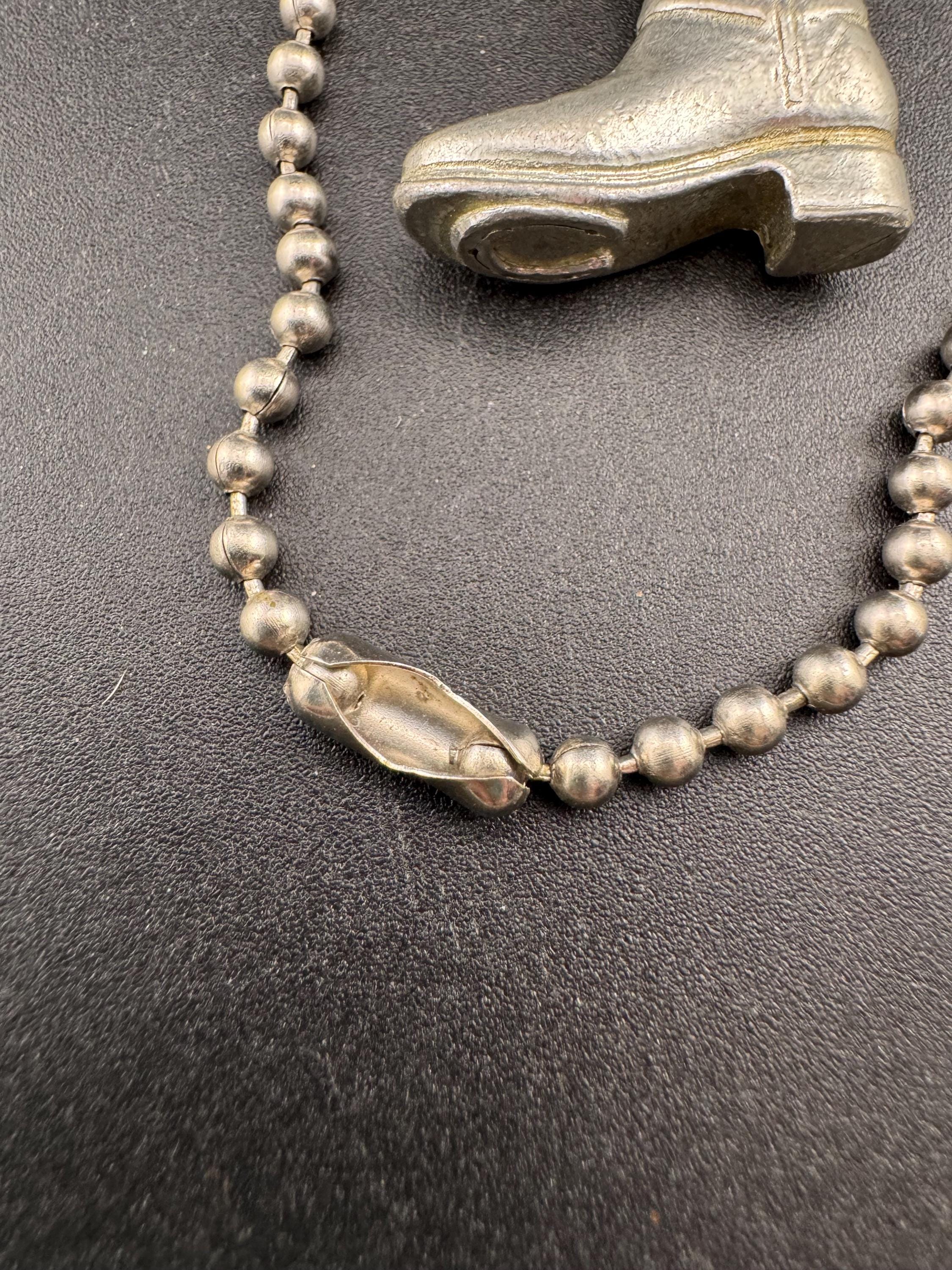 vintage silver riding boot weighty pendant on a 80cm metal ball bead long chain