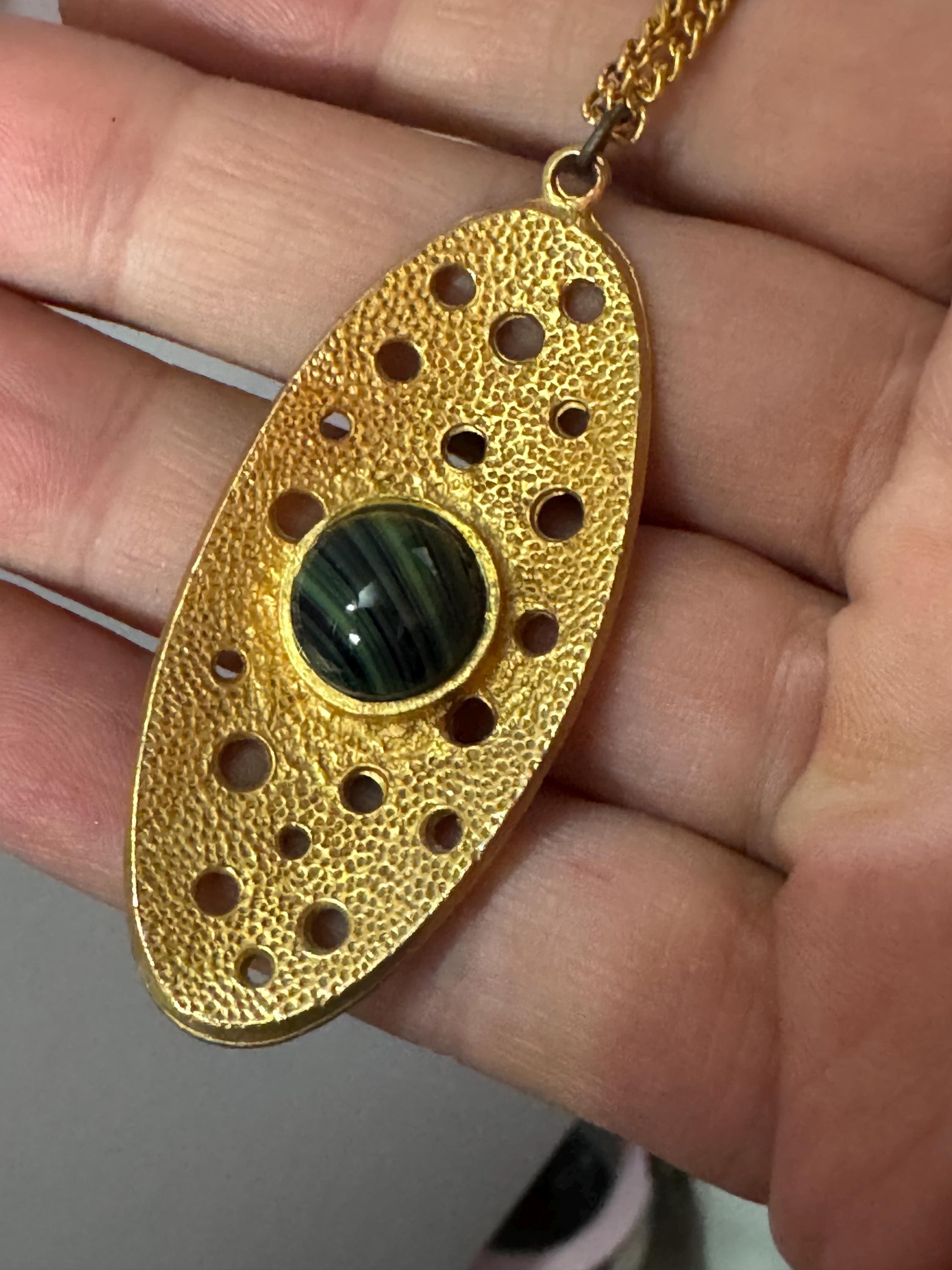 Vintage gold tone brutalist pendant with faux malachite oval cabochon