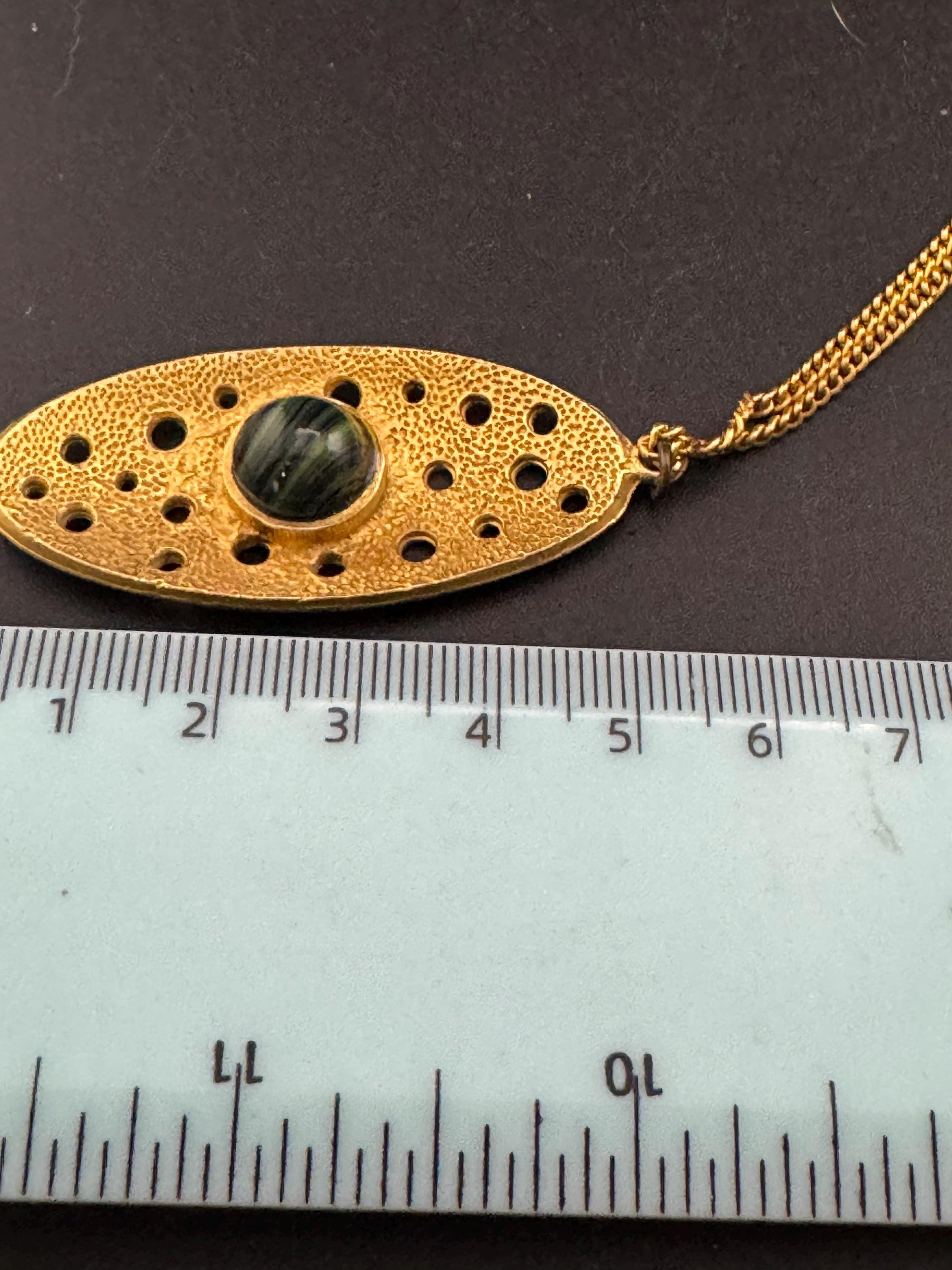 Vintage gold tone brutalist pendant with faux malachite oval cabochon