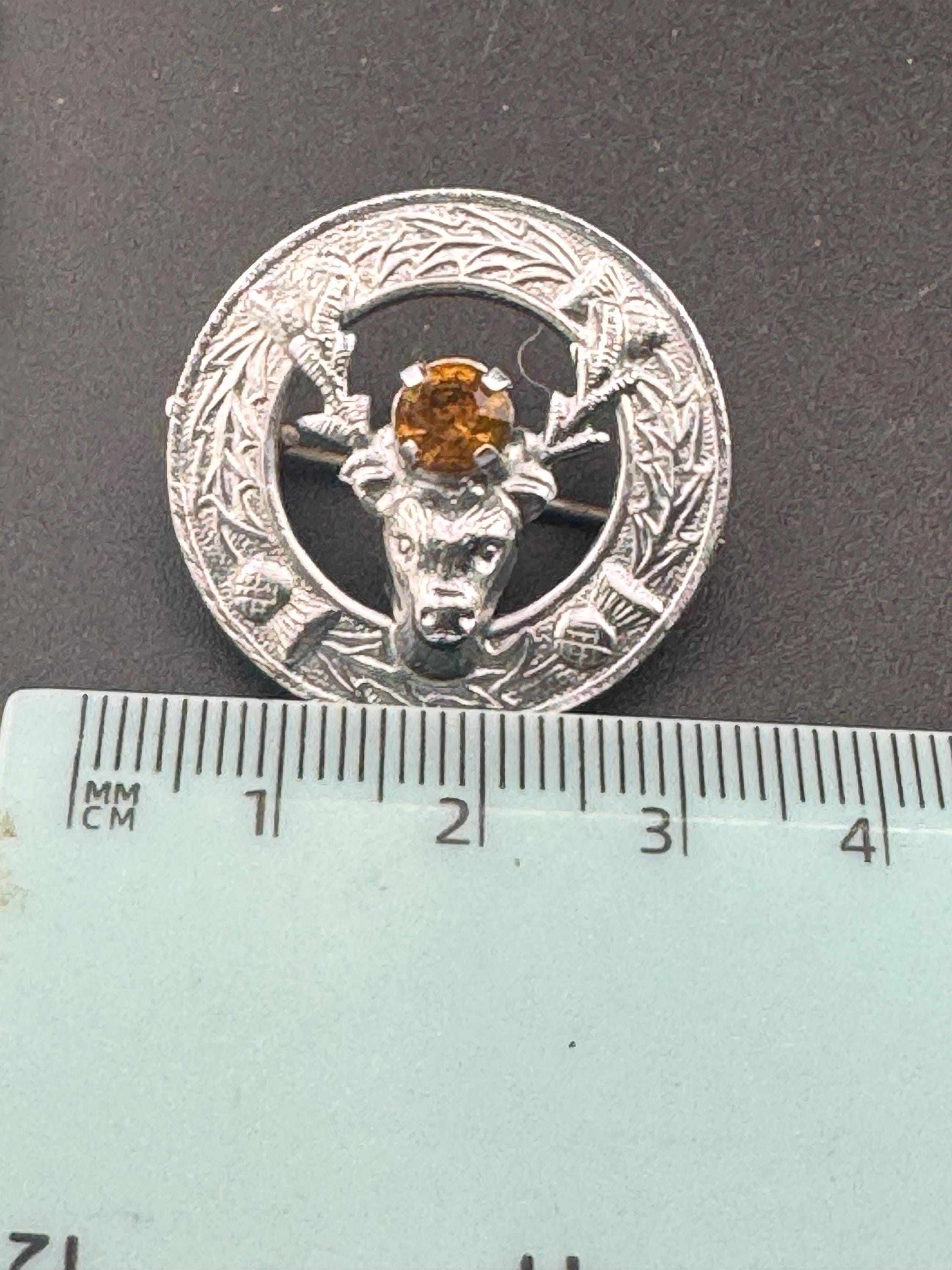 Vintage Scottish citrine glass Thistle and stag Brooch, silver tone