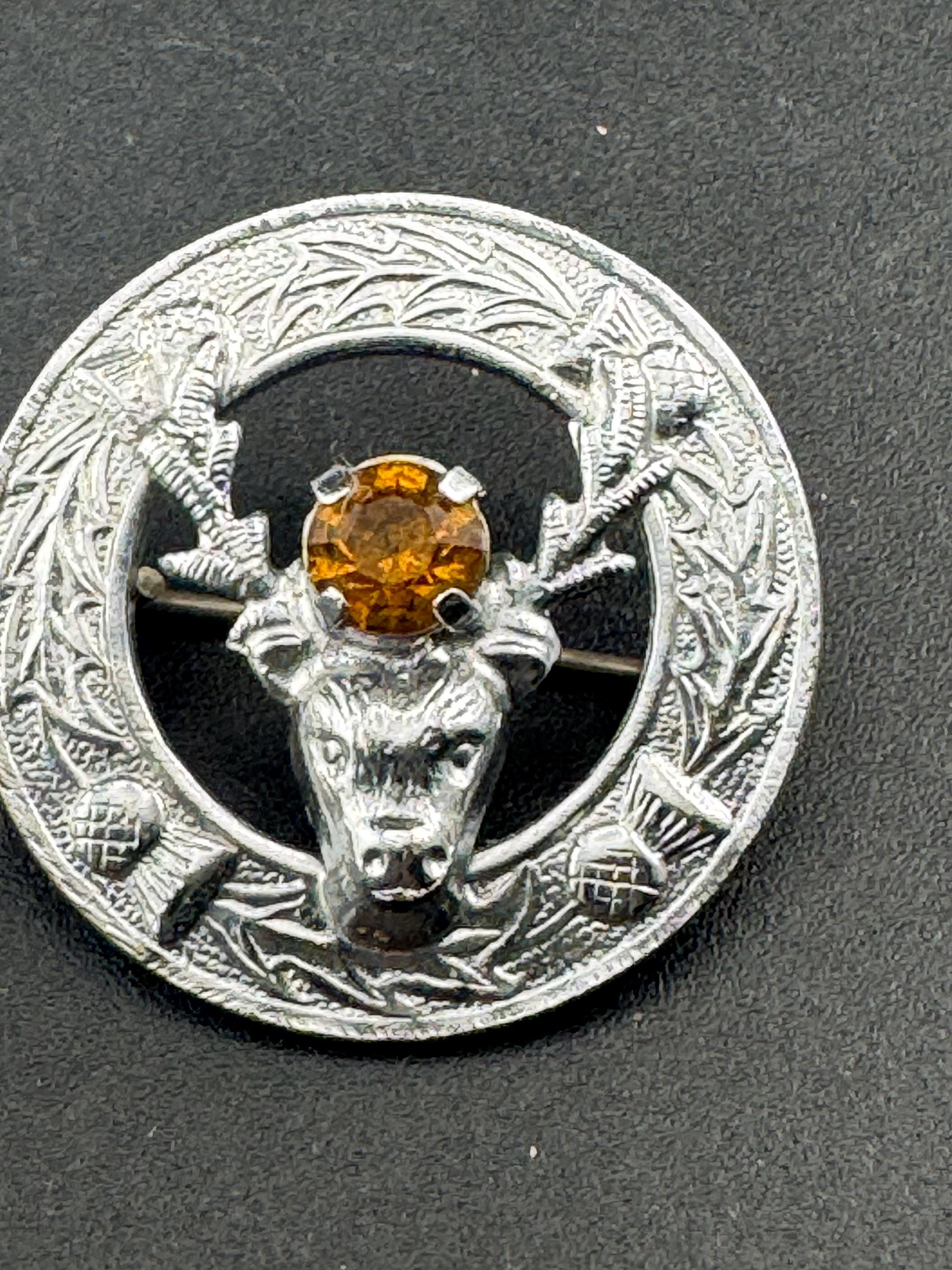 Vintage Scottish citrine glass Thistle and stag Brooch, silver tone