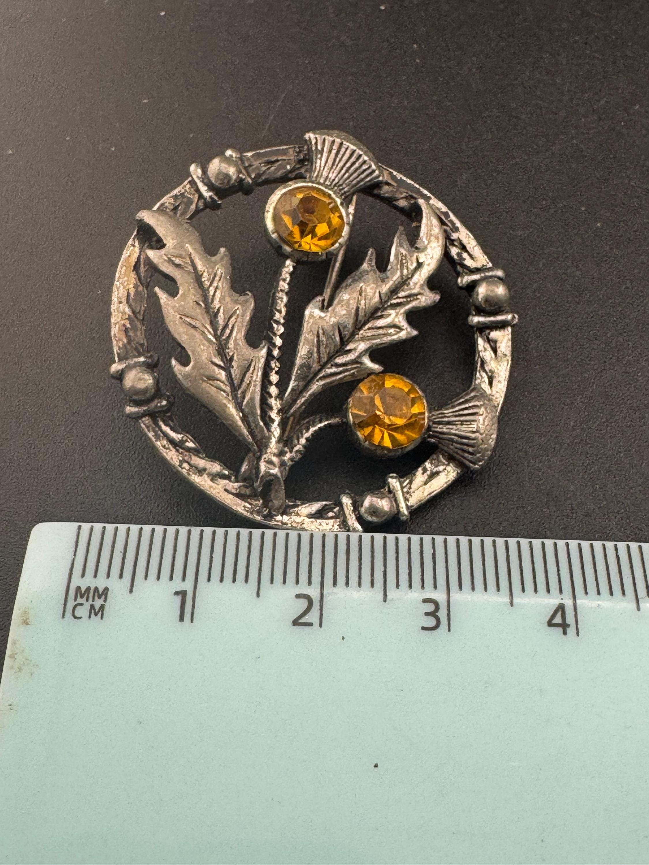 Vintage Scottish thistle brooch set with faux glass citrine, silver tone