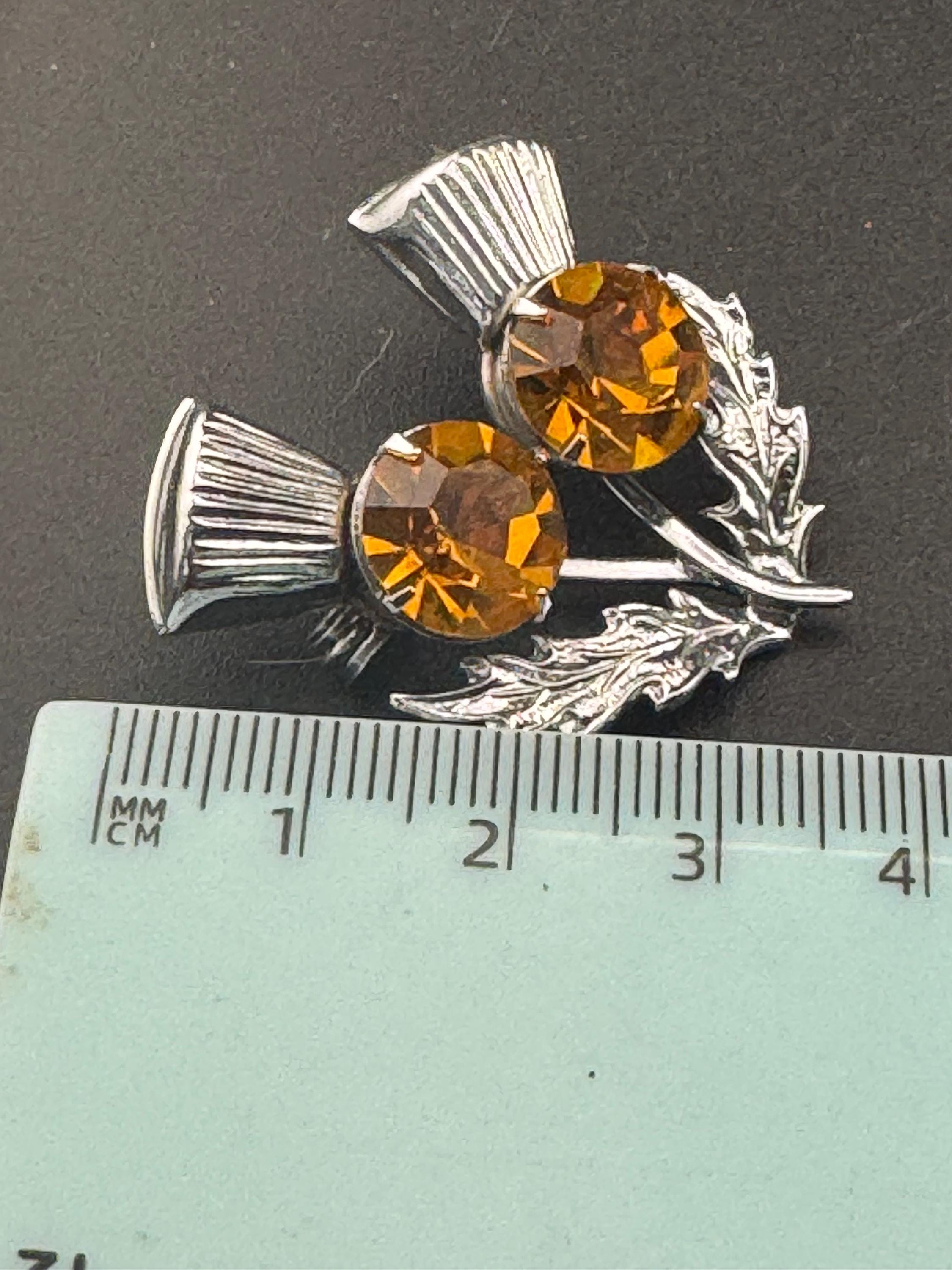 Vintage Scottish thistle brooch set with faux glass citrine, silver chrome metal