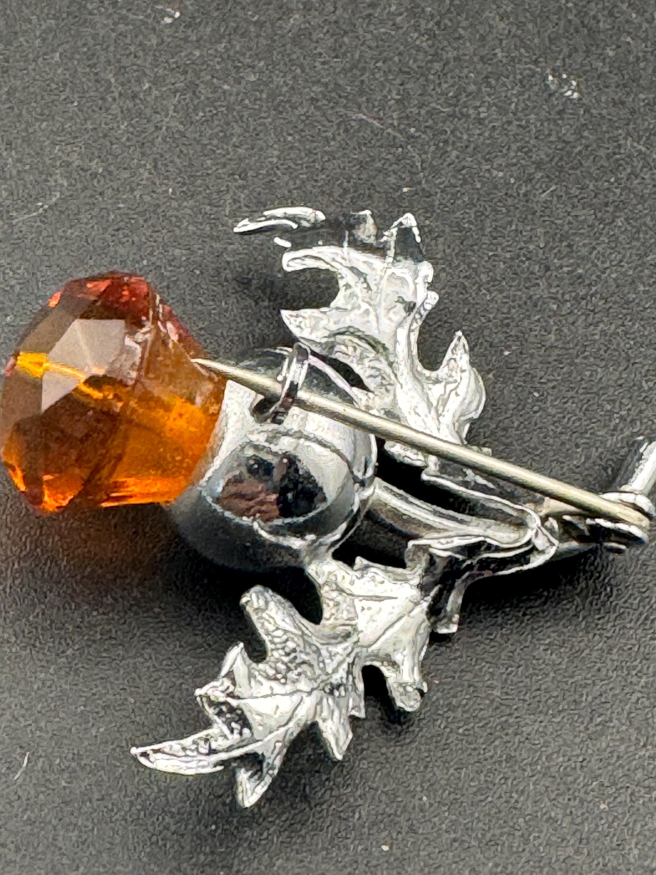Vintage Scottish thistle brooch set with cut glass citrine flower , silver plated