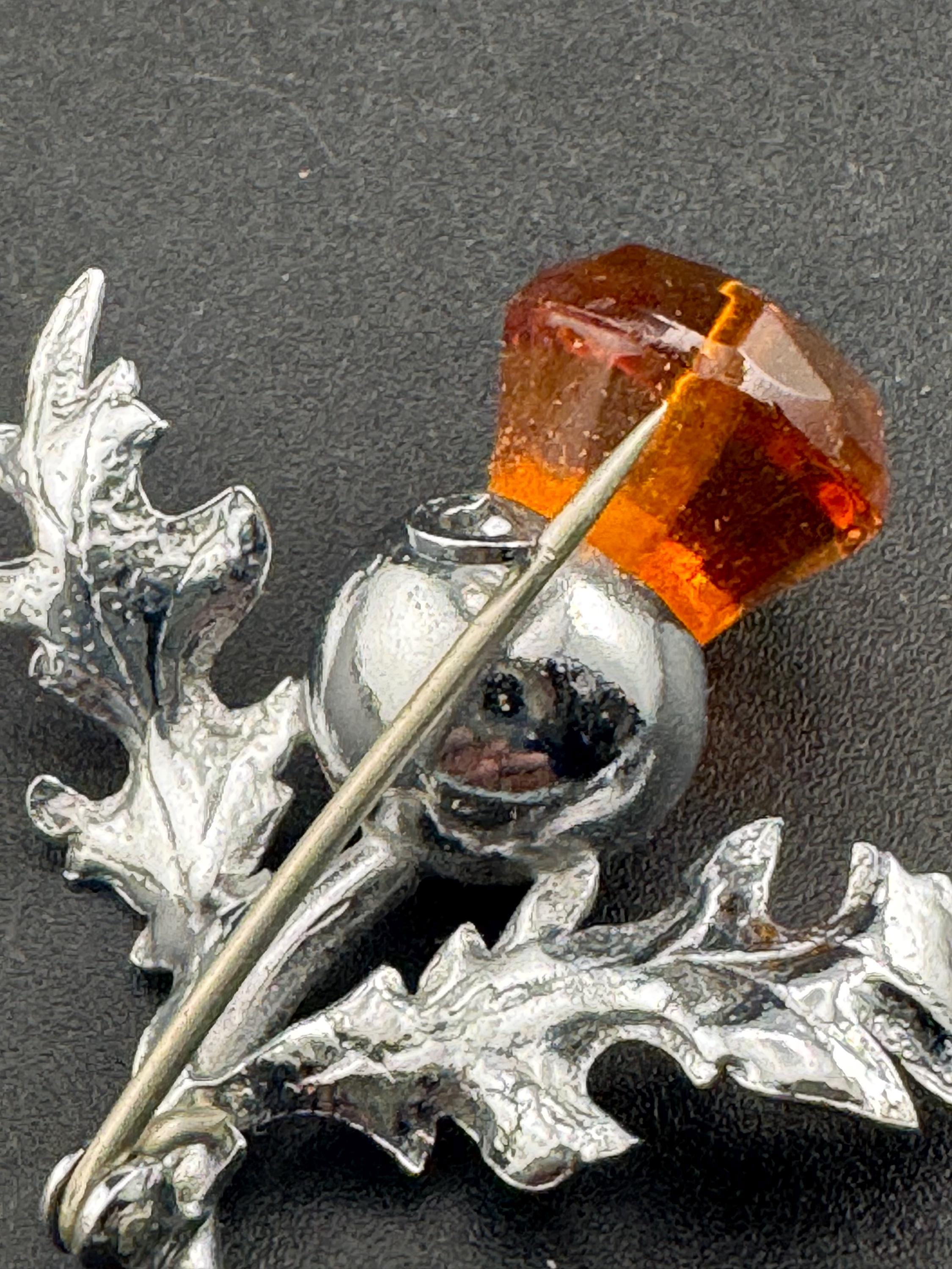 Vintage Scottish thistle brooch set with cut glass citrine flower , silver plated