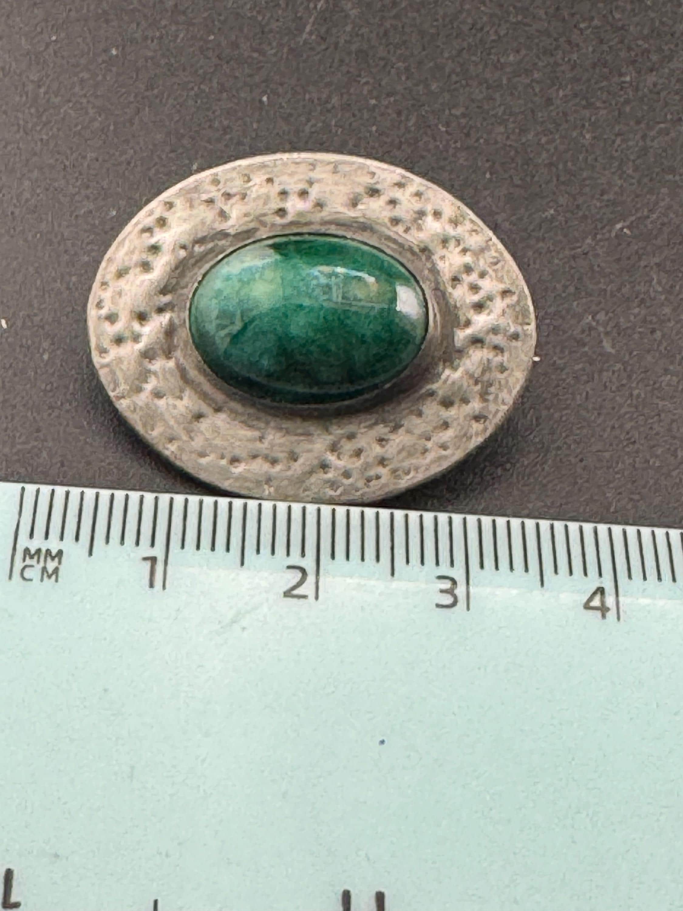 Vintage arts and crafts pewter brooch, green cabochon Ruskin style