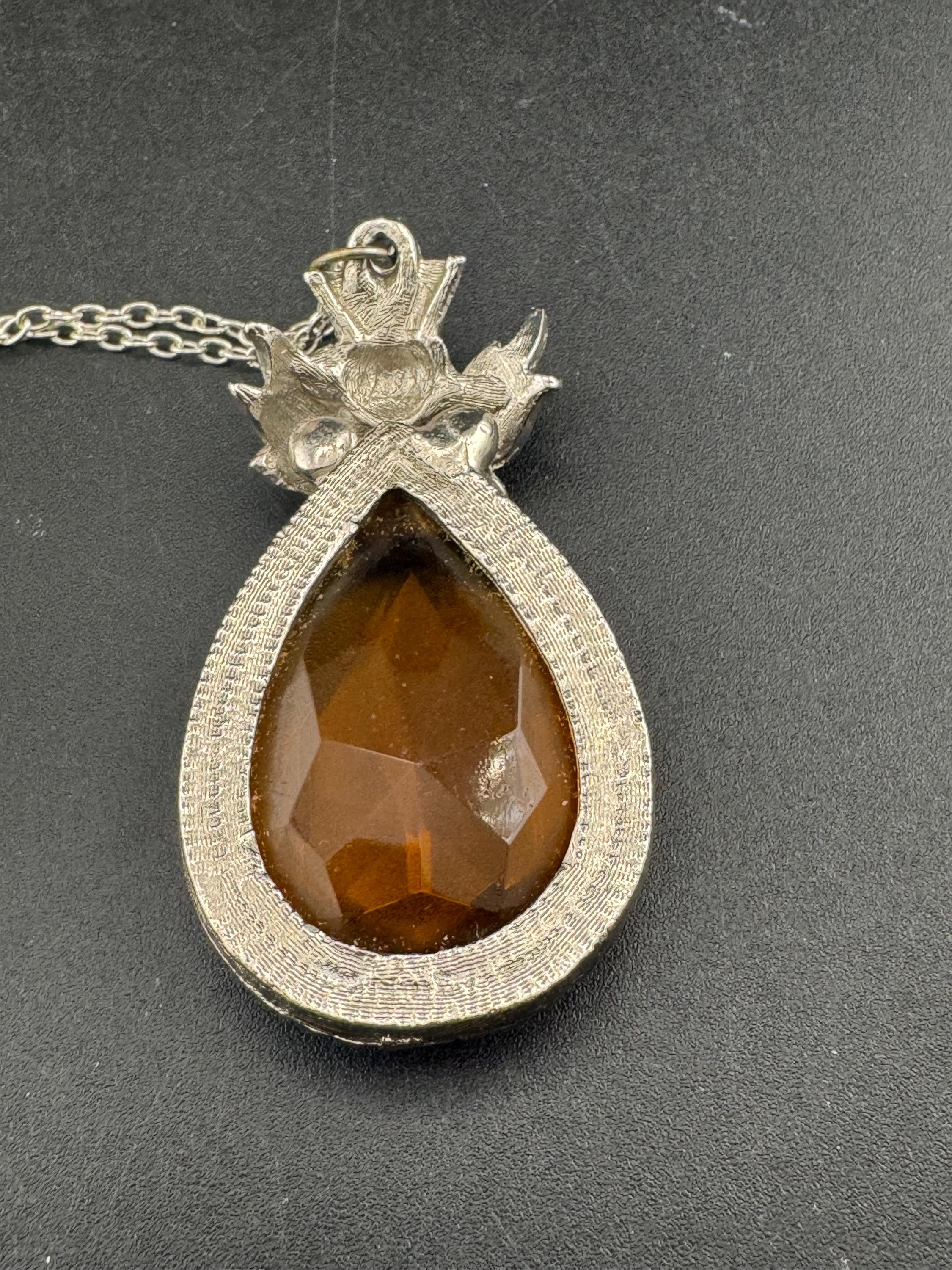 Scottish thistle orange faceted Glass teardrop pendant on 50cm later chain , silver tone