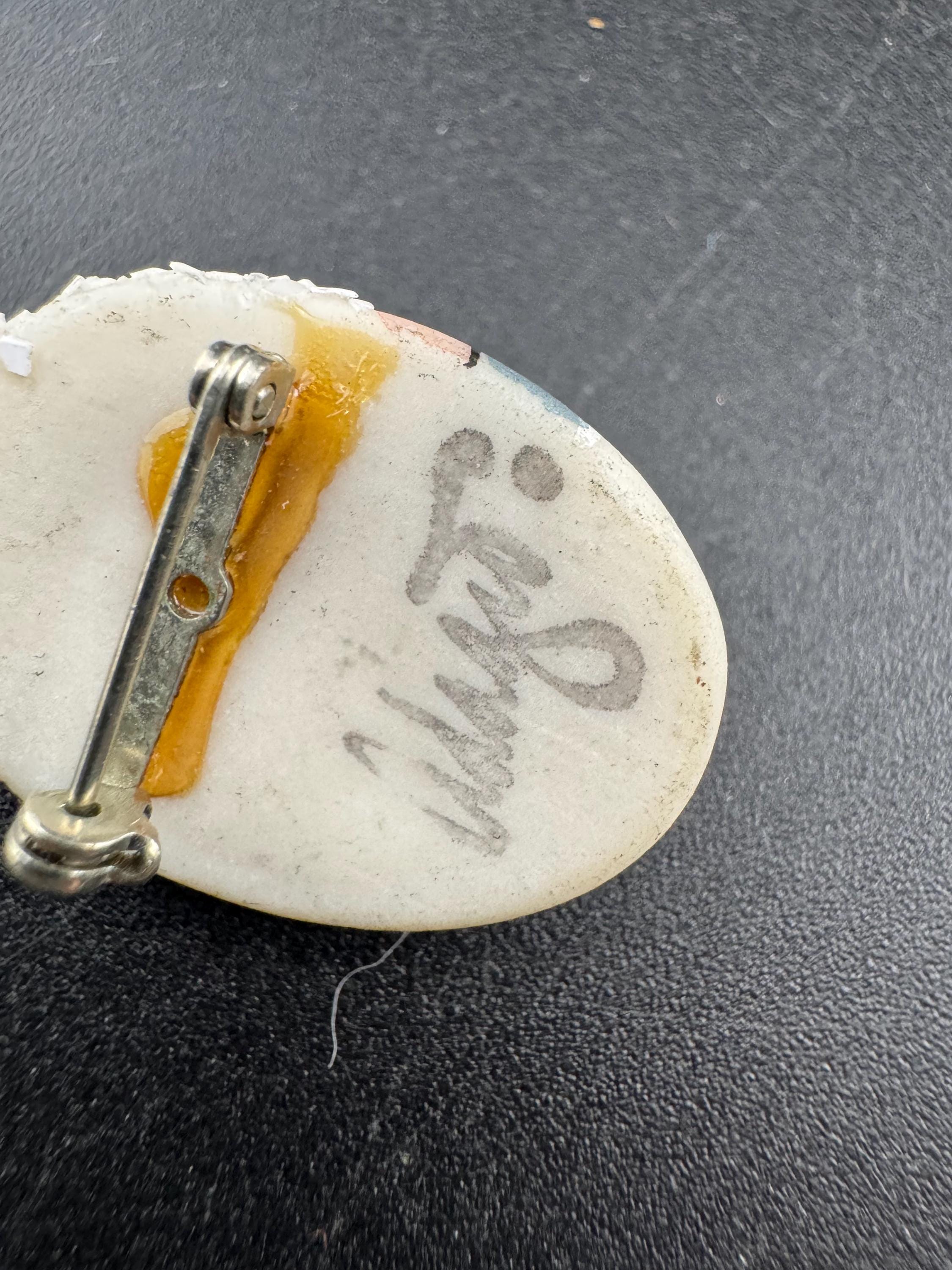 Vintage small signed ceramic flapper face brooch: art deco