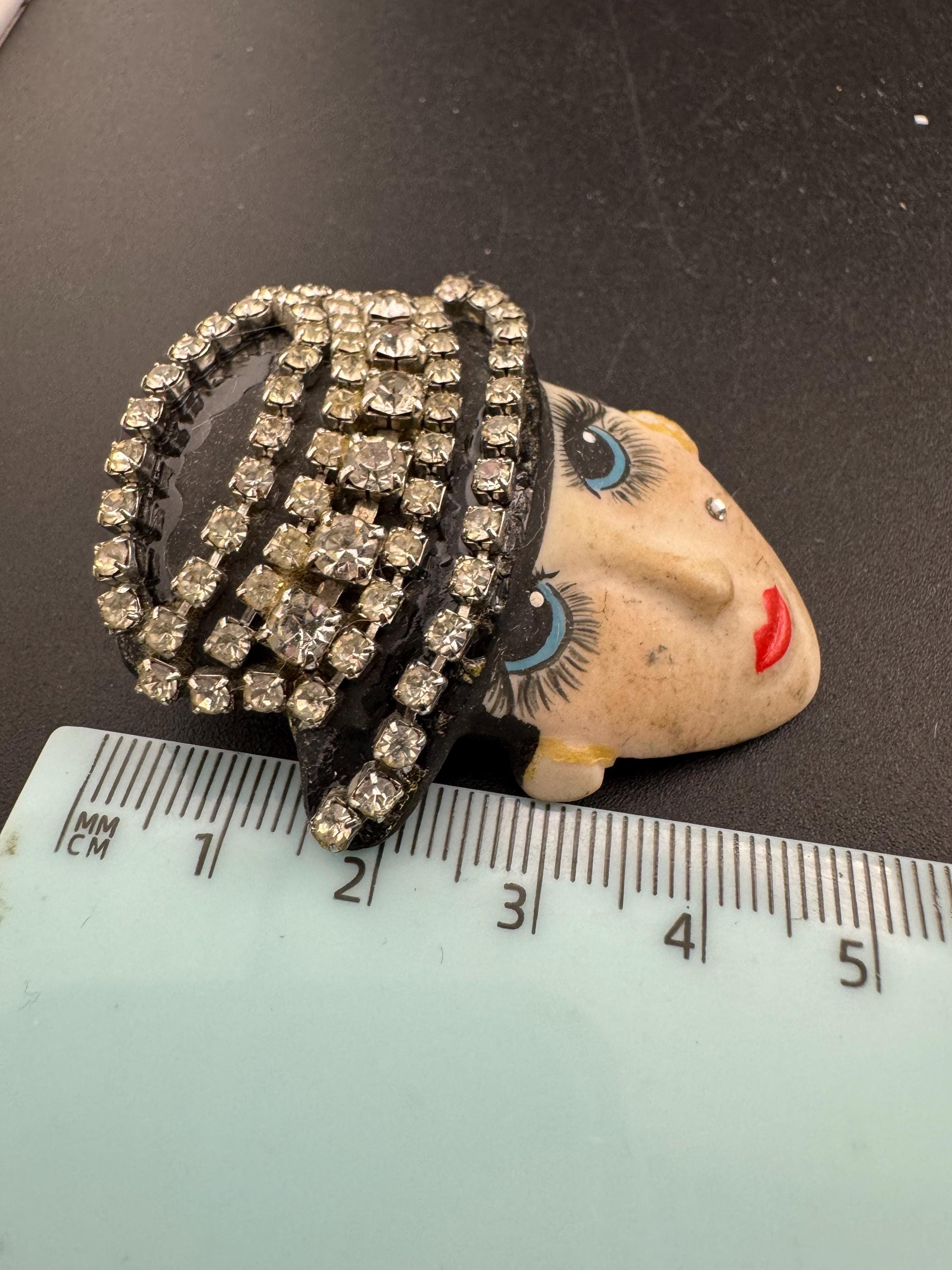 Signed Vintage porcelain rhinestone ceramic flapper face brooch: art deco lady pin