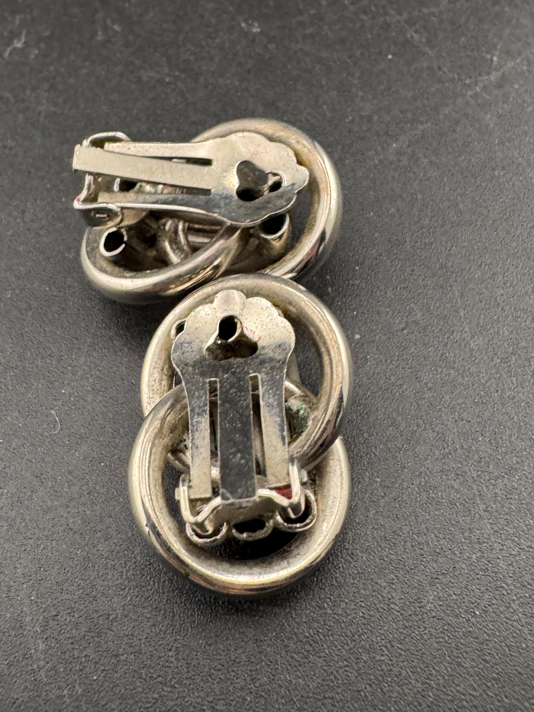 1980s vintage metal tube knot clip on earrings, silver tone