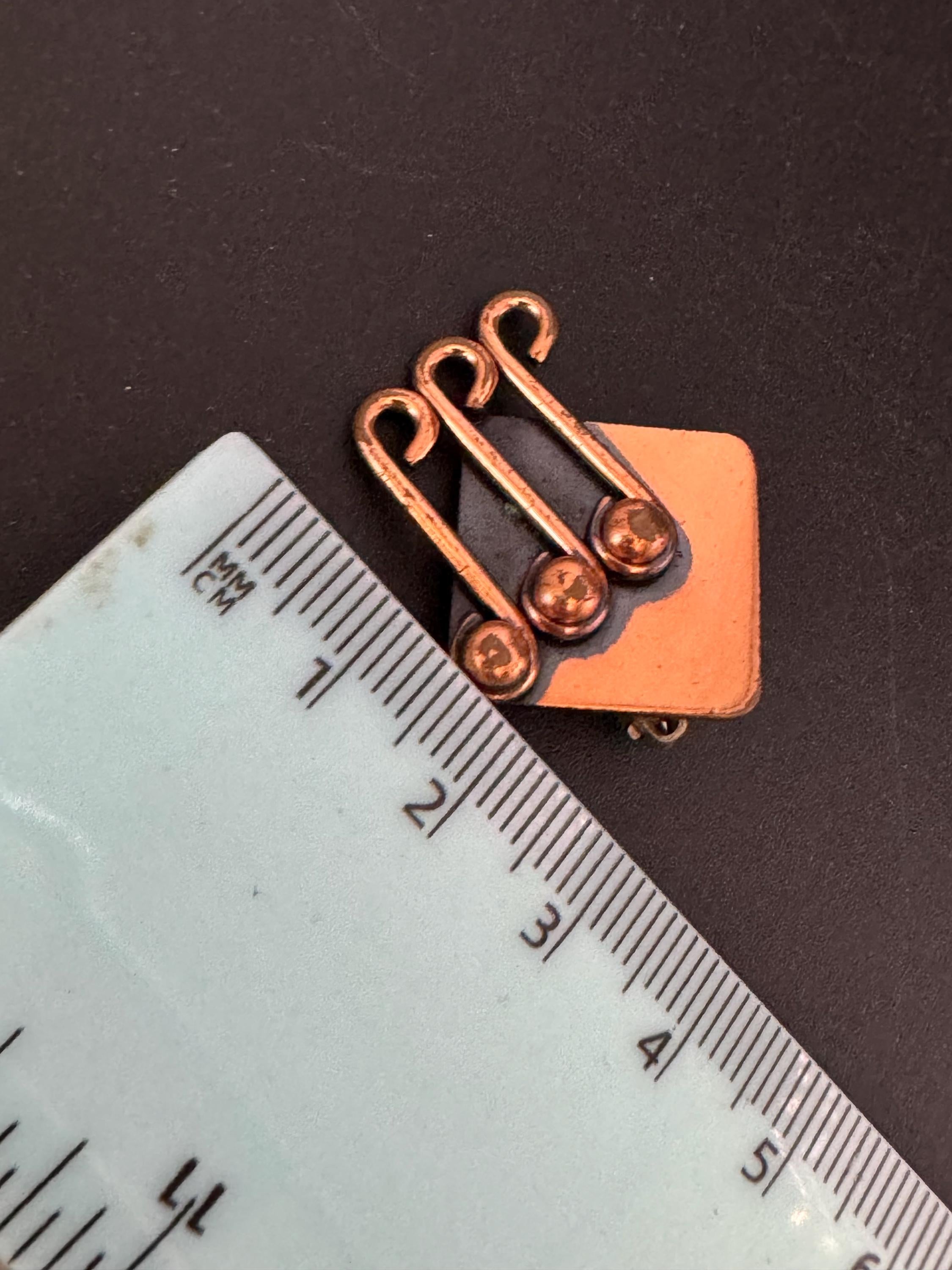 Modernist signed Renoir copper musical clip on earrings 1960s 1970s