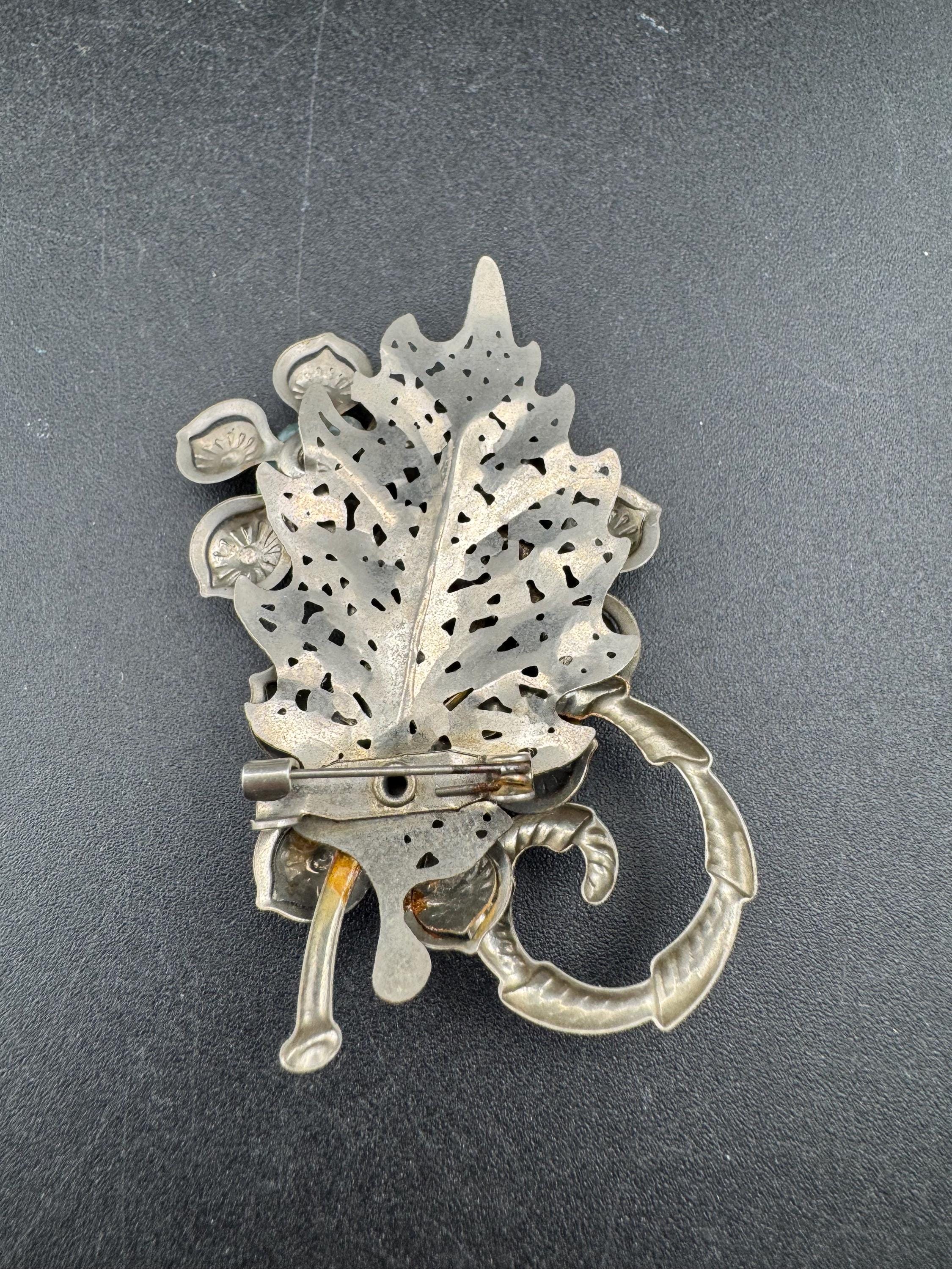 Czech Brooch with red blue green cabochons, silver pressed metal