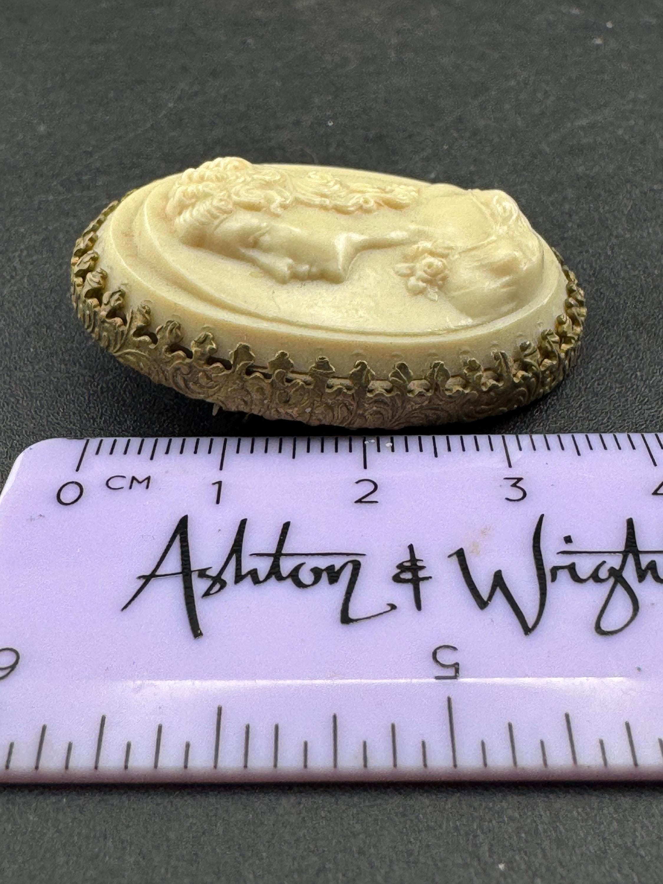 Vintage cream celluloid framed lady cameo brooch, French early plastic