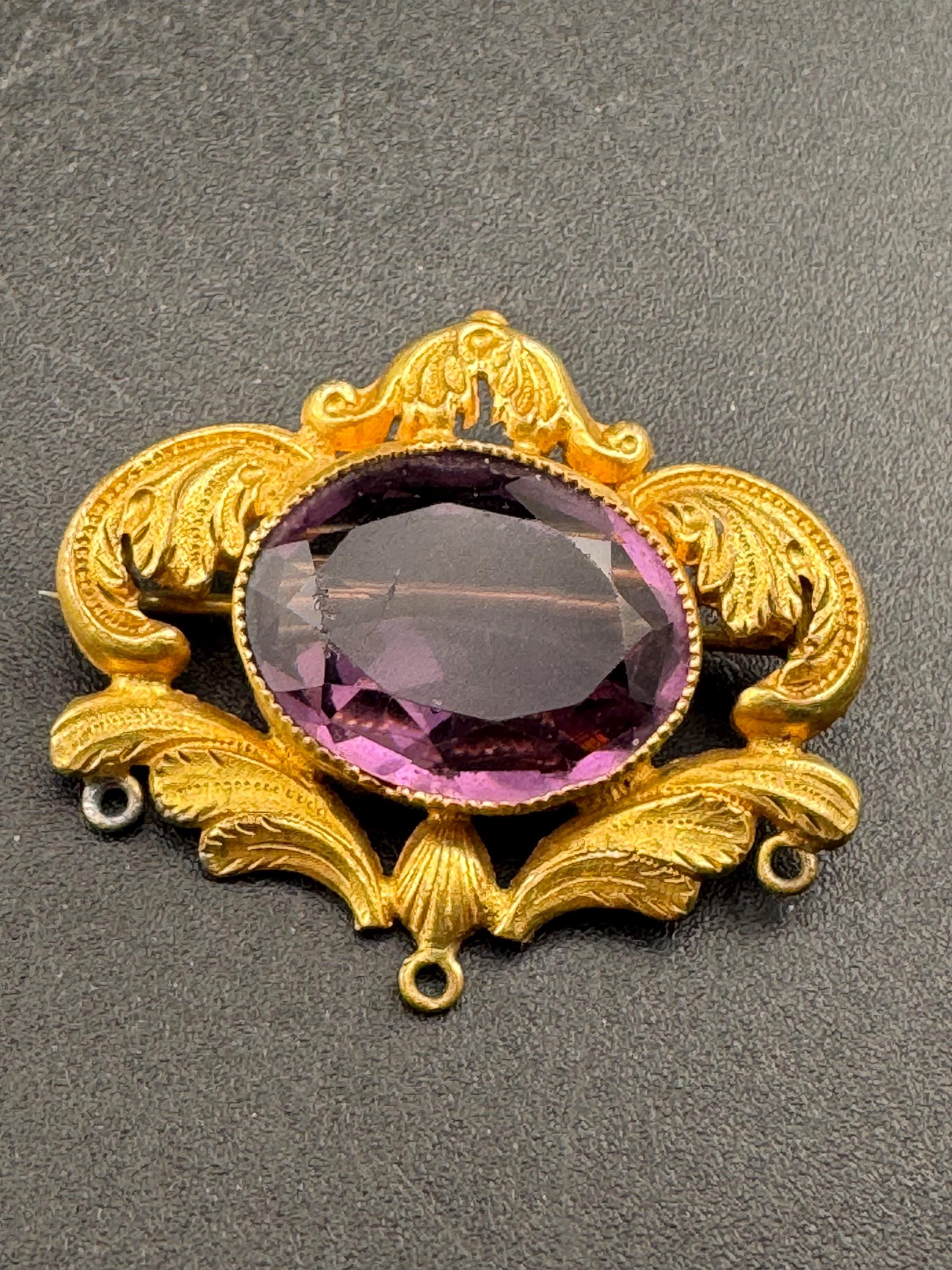 Antique oval amethyst rhinestone brooch, gilt metal pin, Victorian 1900s