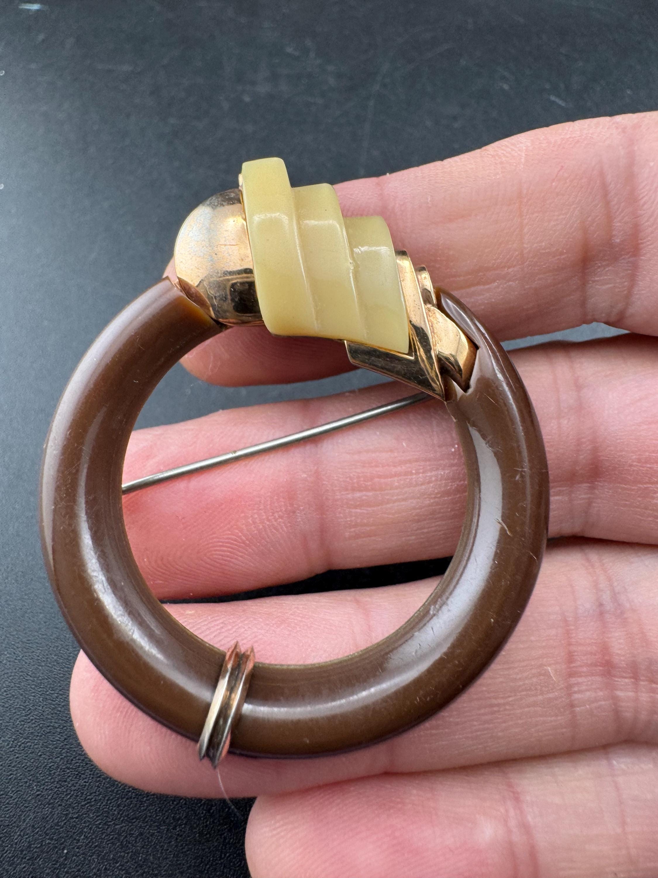 Vintage machine age brown enamel modernist brooch, galalith and chrome