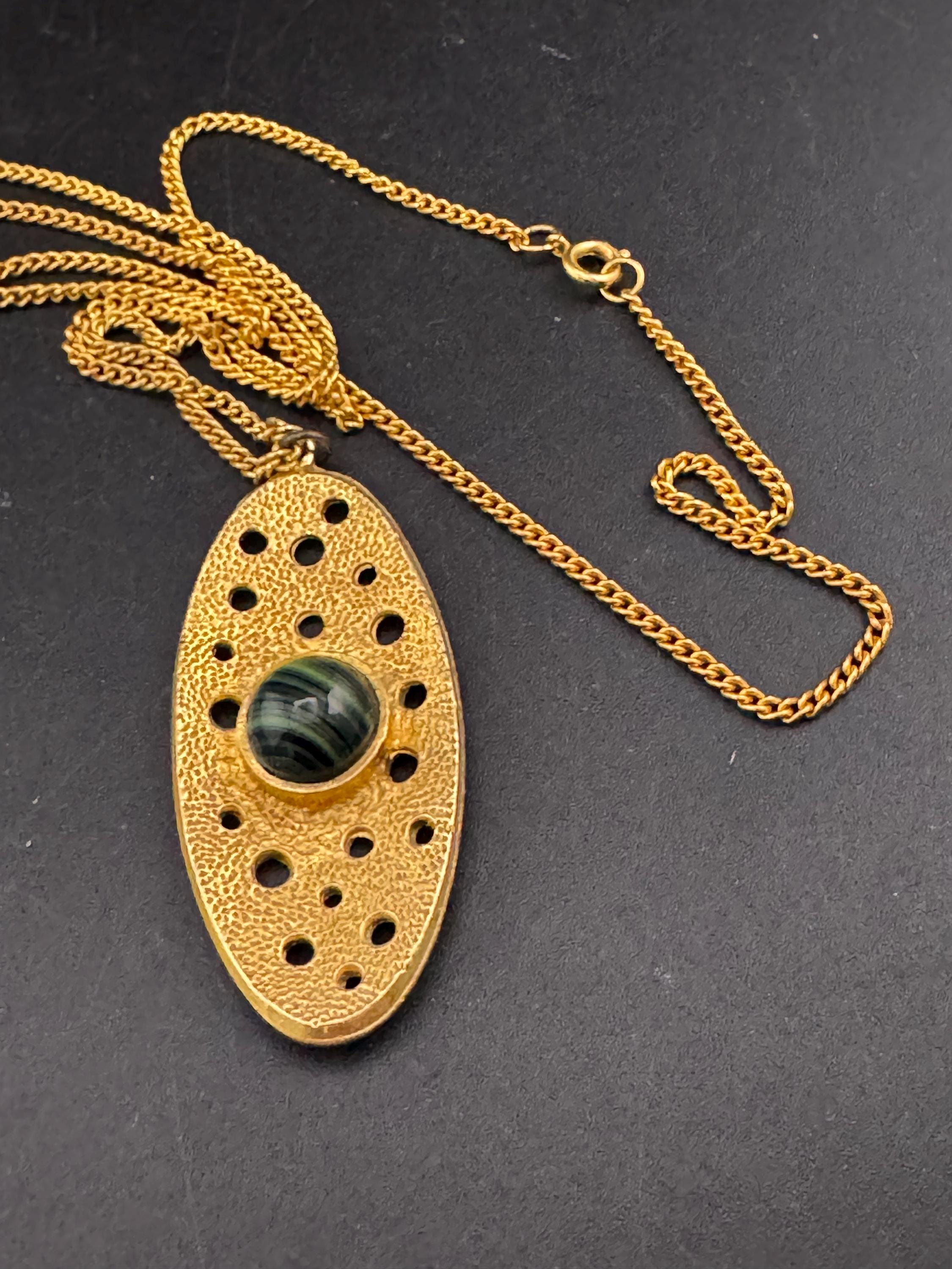 Vintage gold tone brutalist pendant with faux malachite oval cabochon