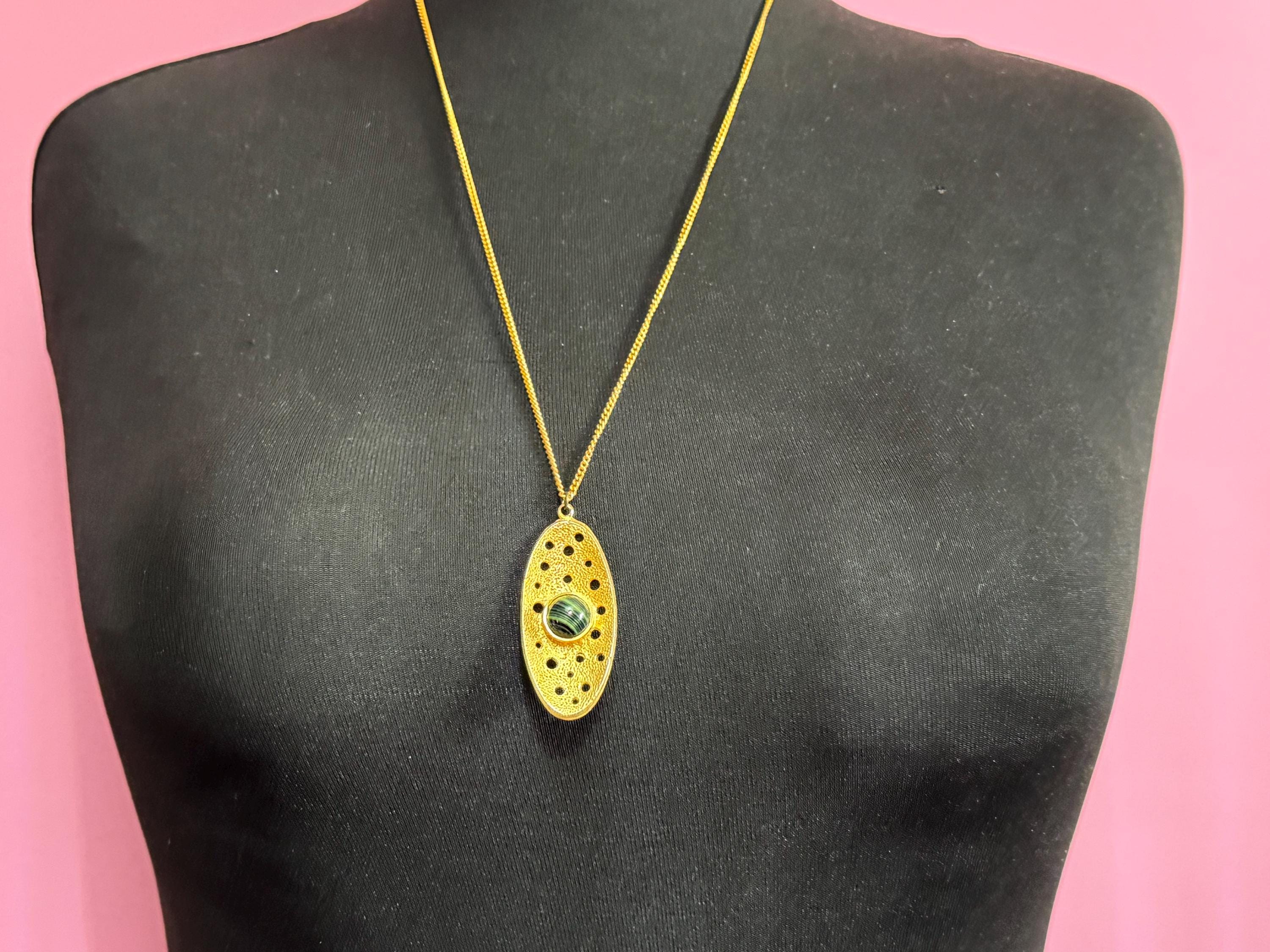 Vintage gold tone brutalist pendant with faux malachite oval cabochon