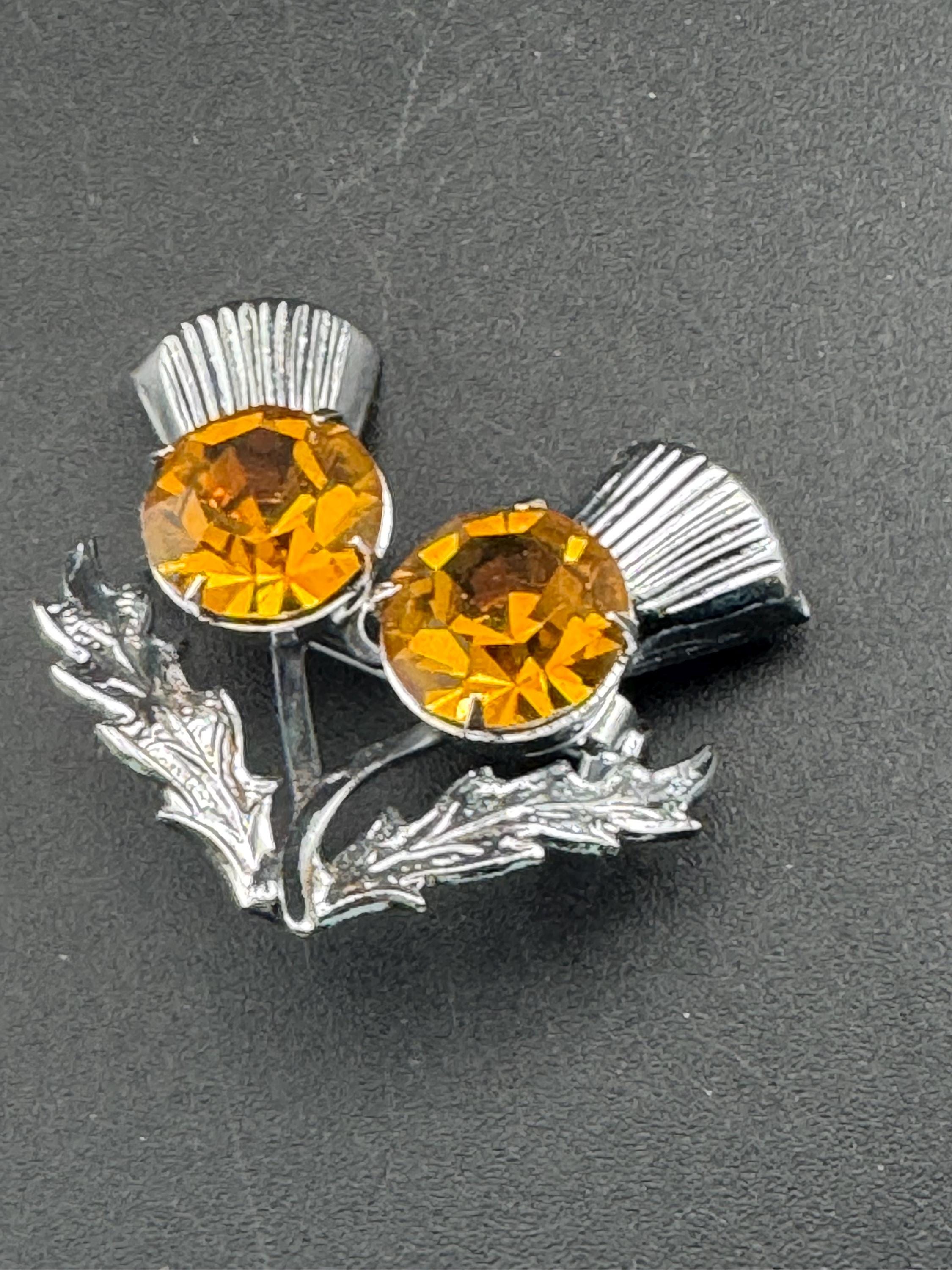 Vintage Scottish thistle brooch set with faux glass citrine, silver chrome metal