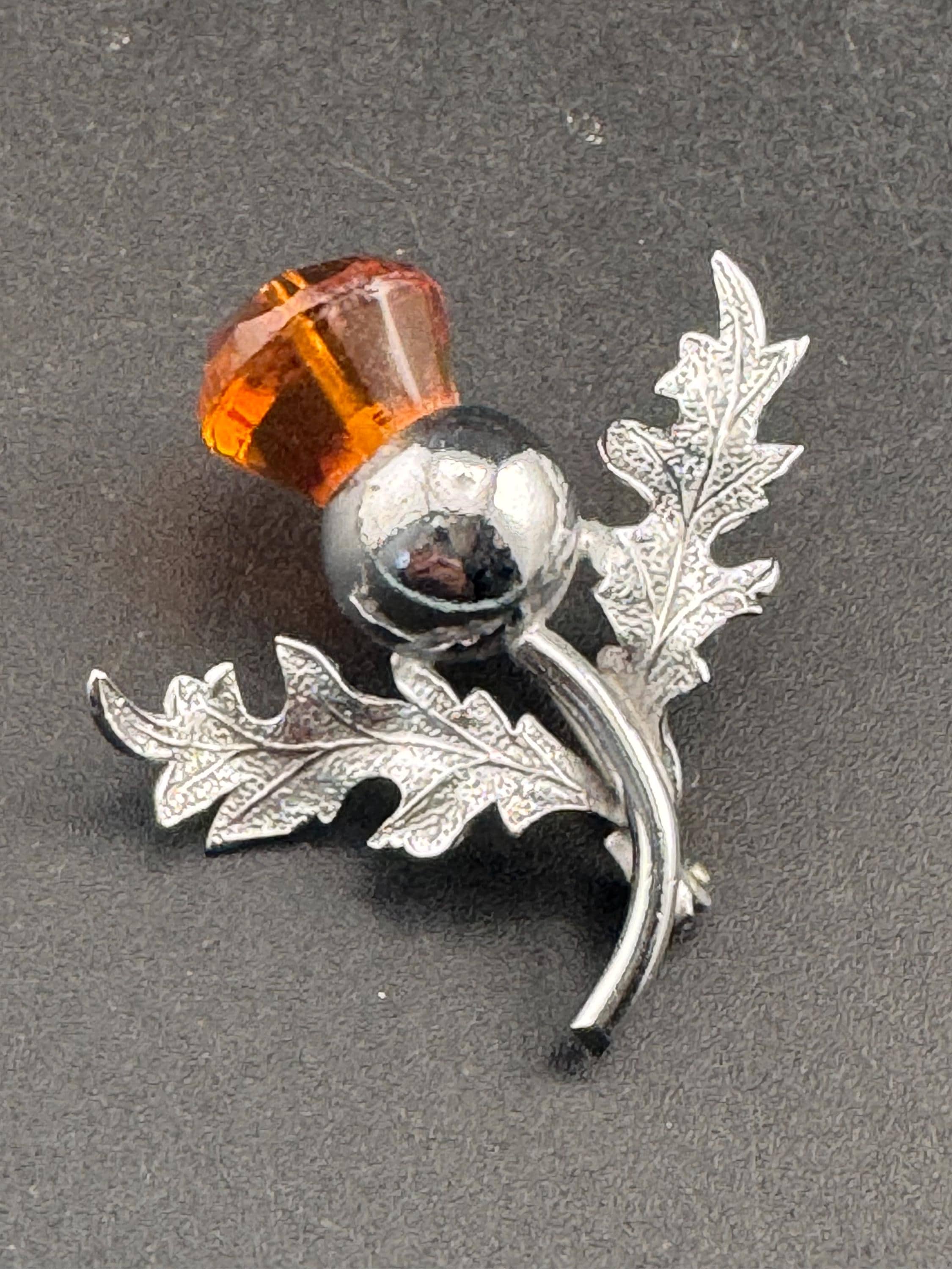 Vintage Scottish thistle brooch set with cut glass citrine flower , silver plated