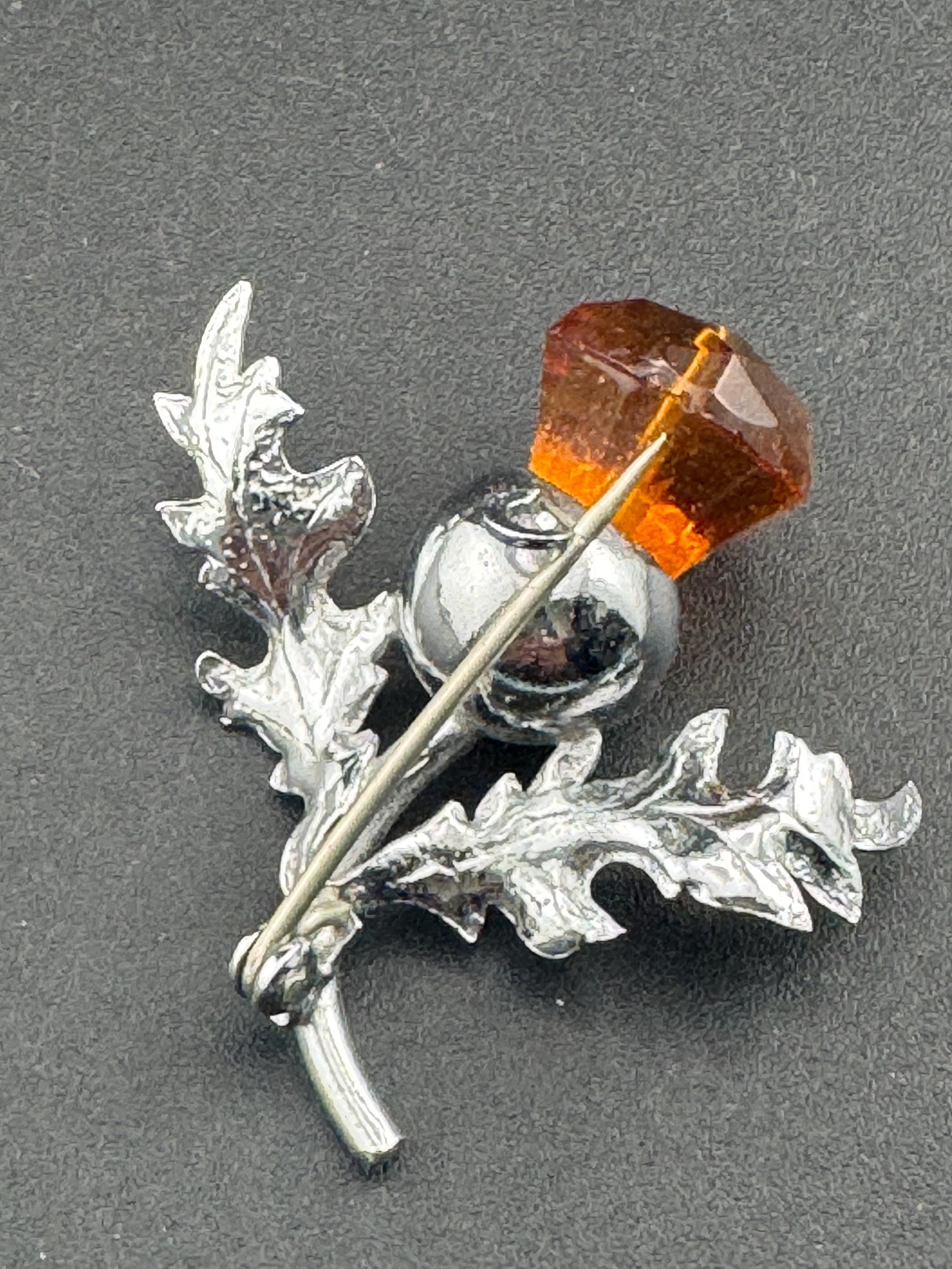 Vintage Scottish thistle brooch set with cut glass citrine flower , silver plated