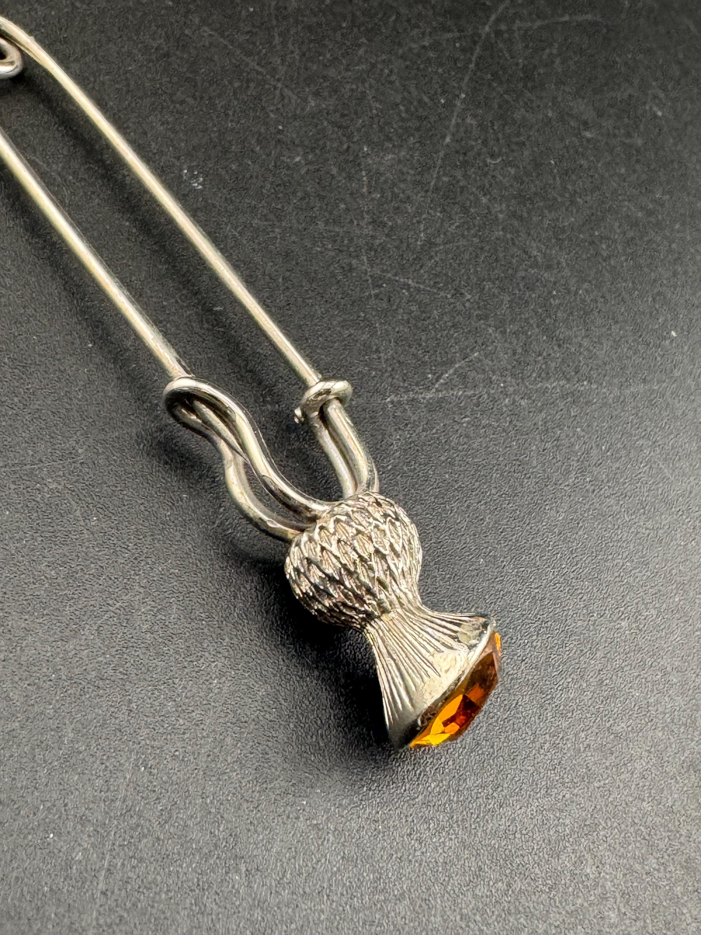 Vintage Scottish thistle brooch set with faux glass citrine, silver tone