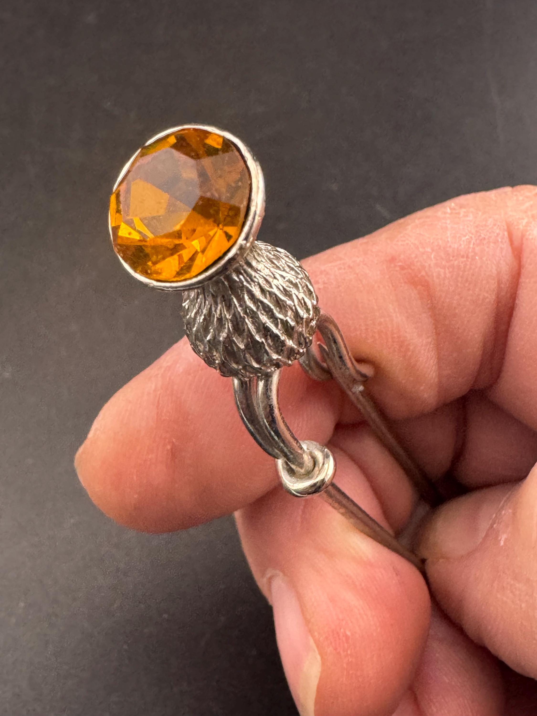 Vintage Scottish thistle brooch set with faux glass citrine, silver tone