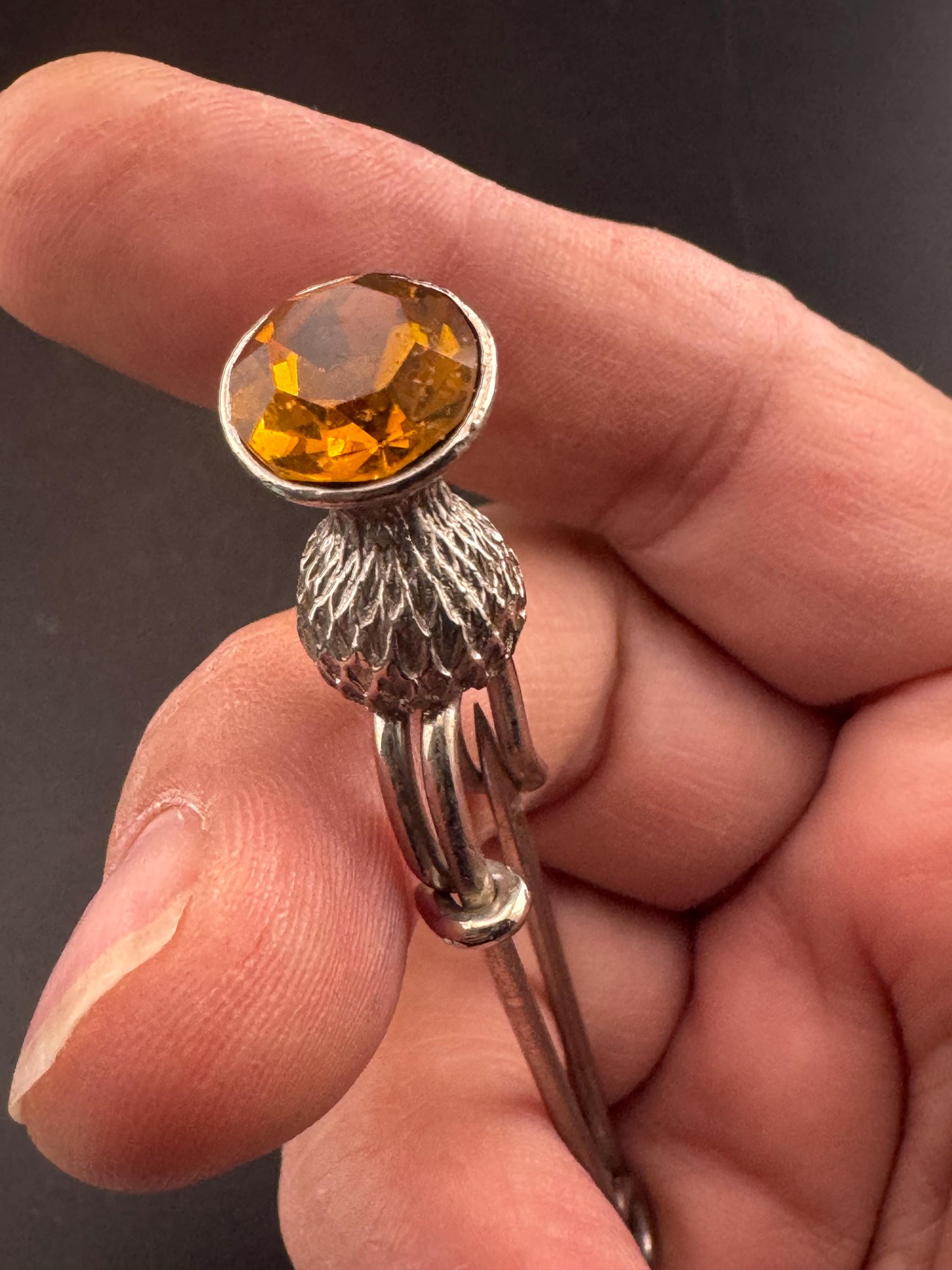 Vintage Scottish thistle brooch set with faux glass citrine, silver tone