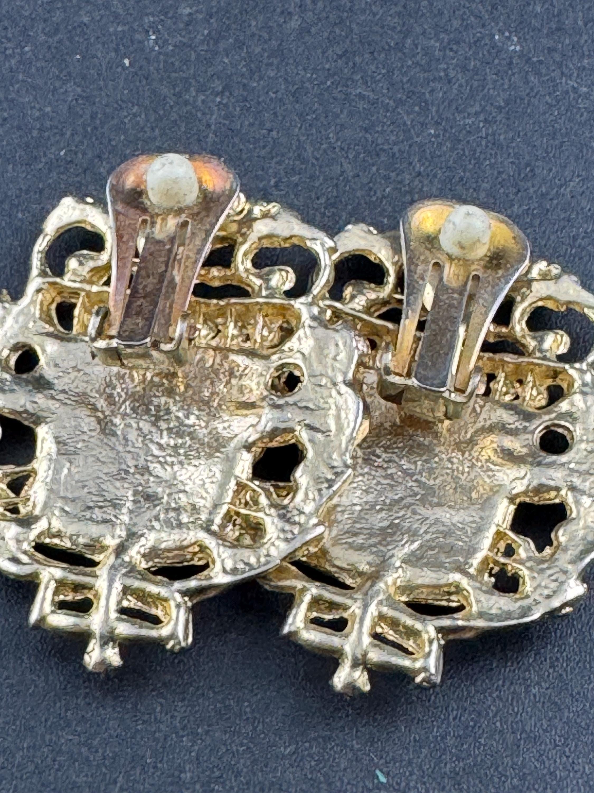 Vintage shield crested eagle clip on earrings, oversized gold tone