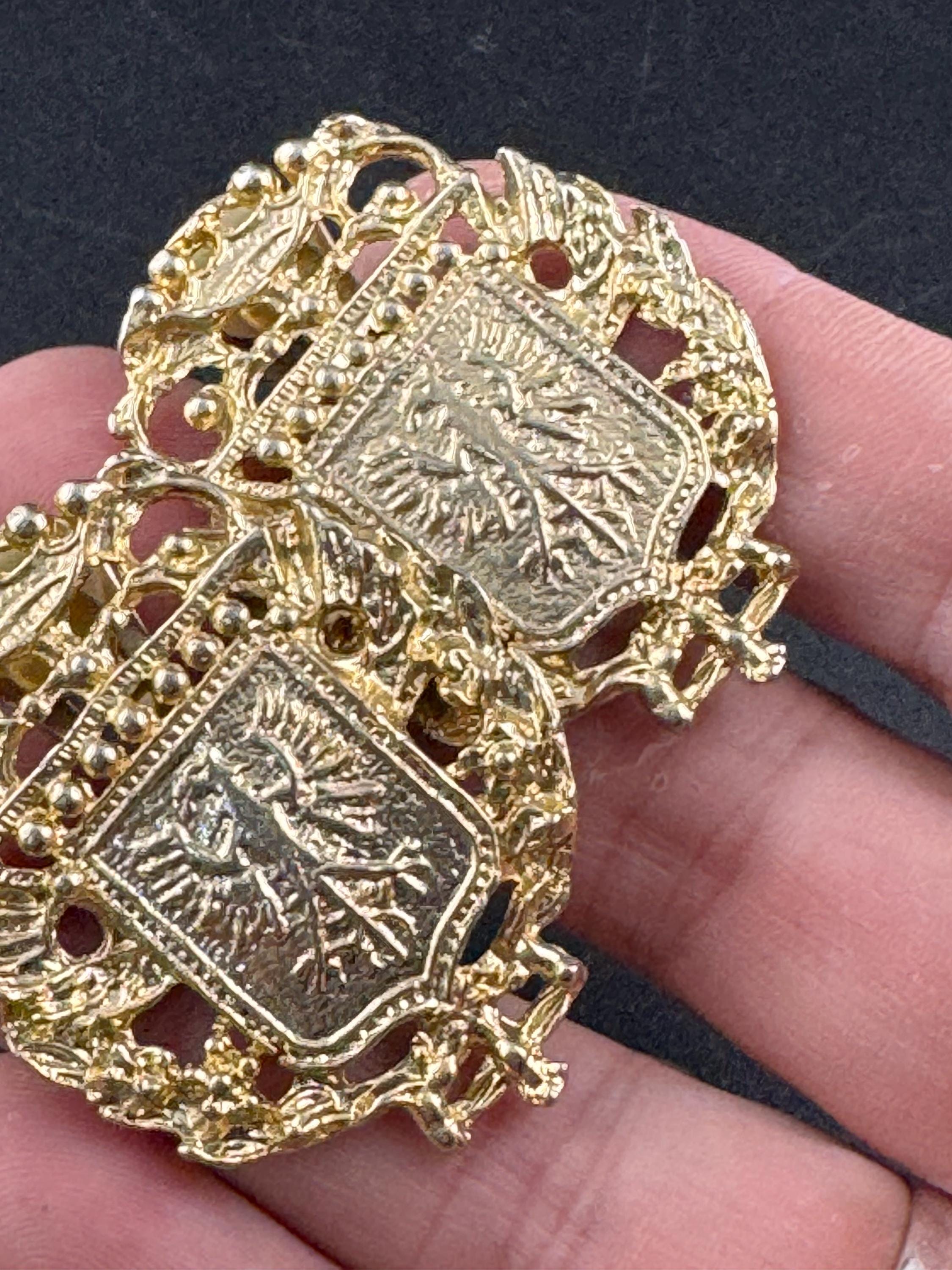 Vintage shield crested eagle clip on earrings, oversized gold tone