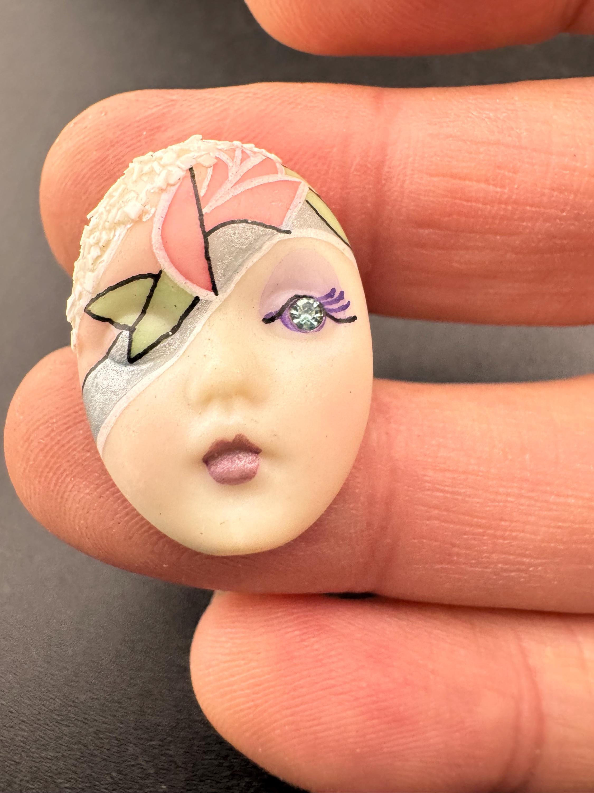 Vintage small signed ceramic flapper face brooch: art deco