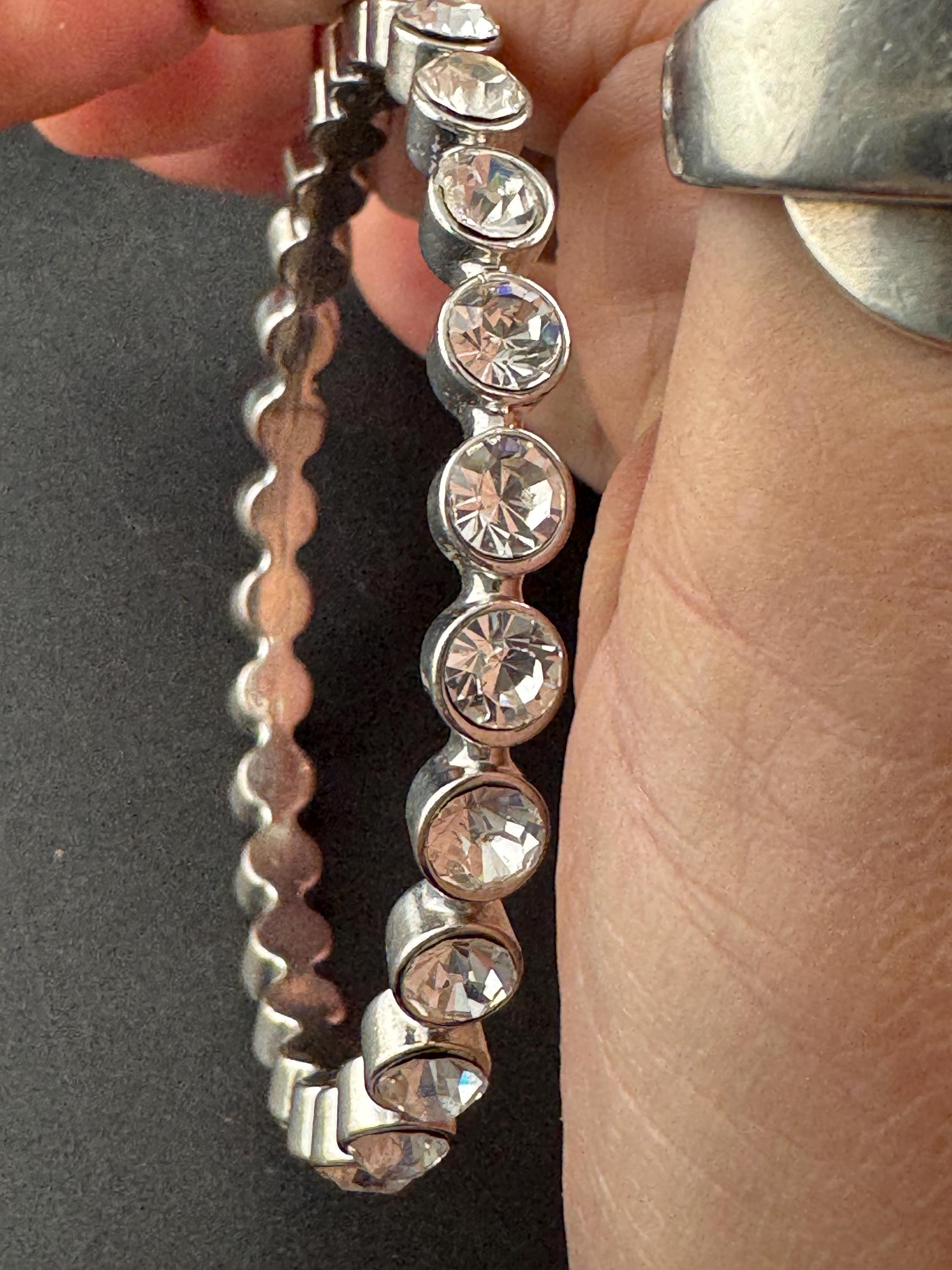 Fixed bezel link bangle with clear diamanté , silver tone bracelet