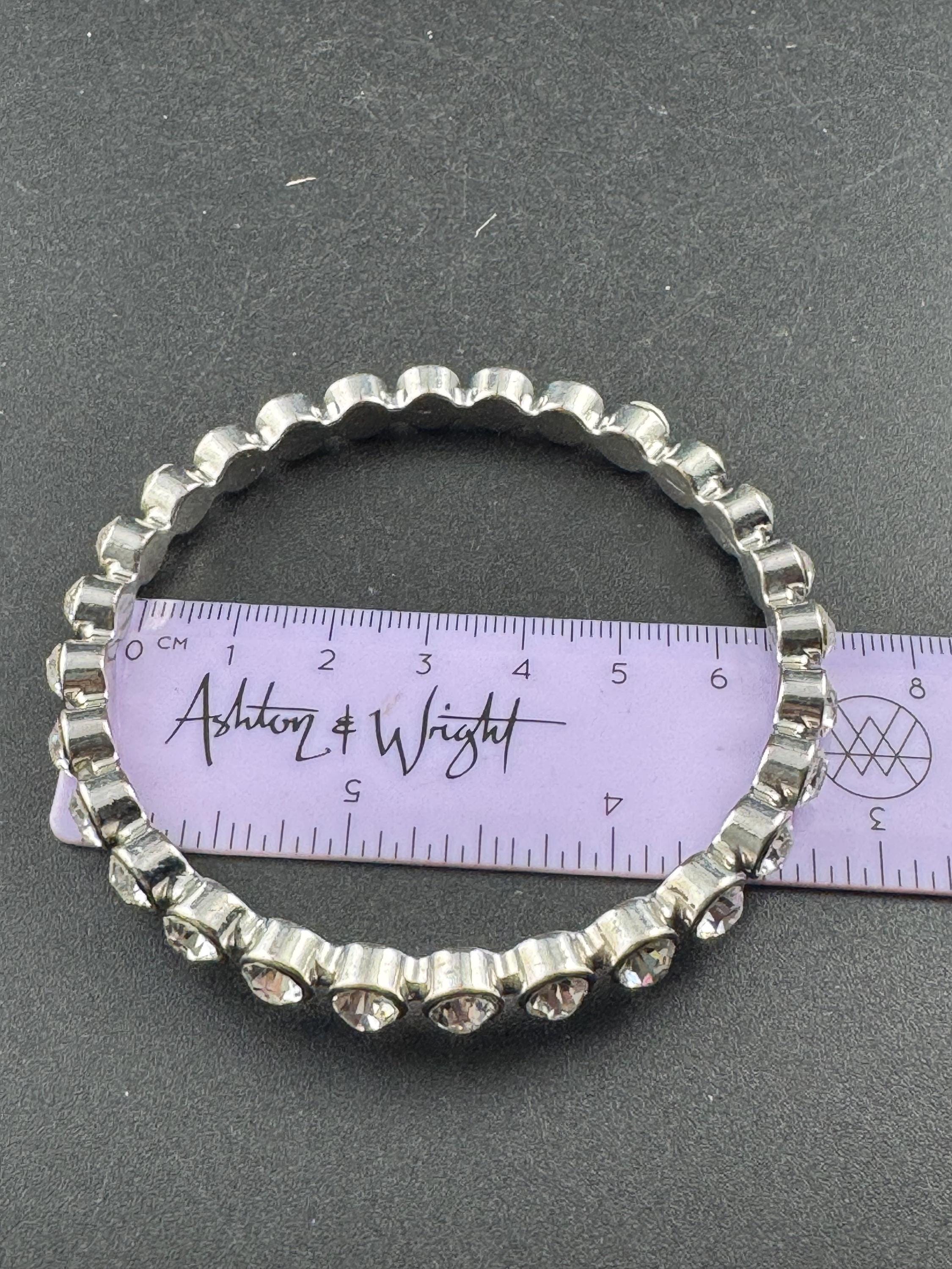 Fixed bezel link bangle with clear diamanté , silver tone bracelet