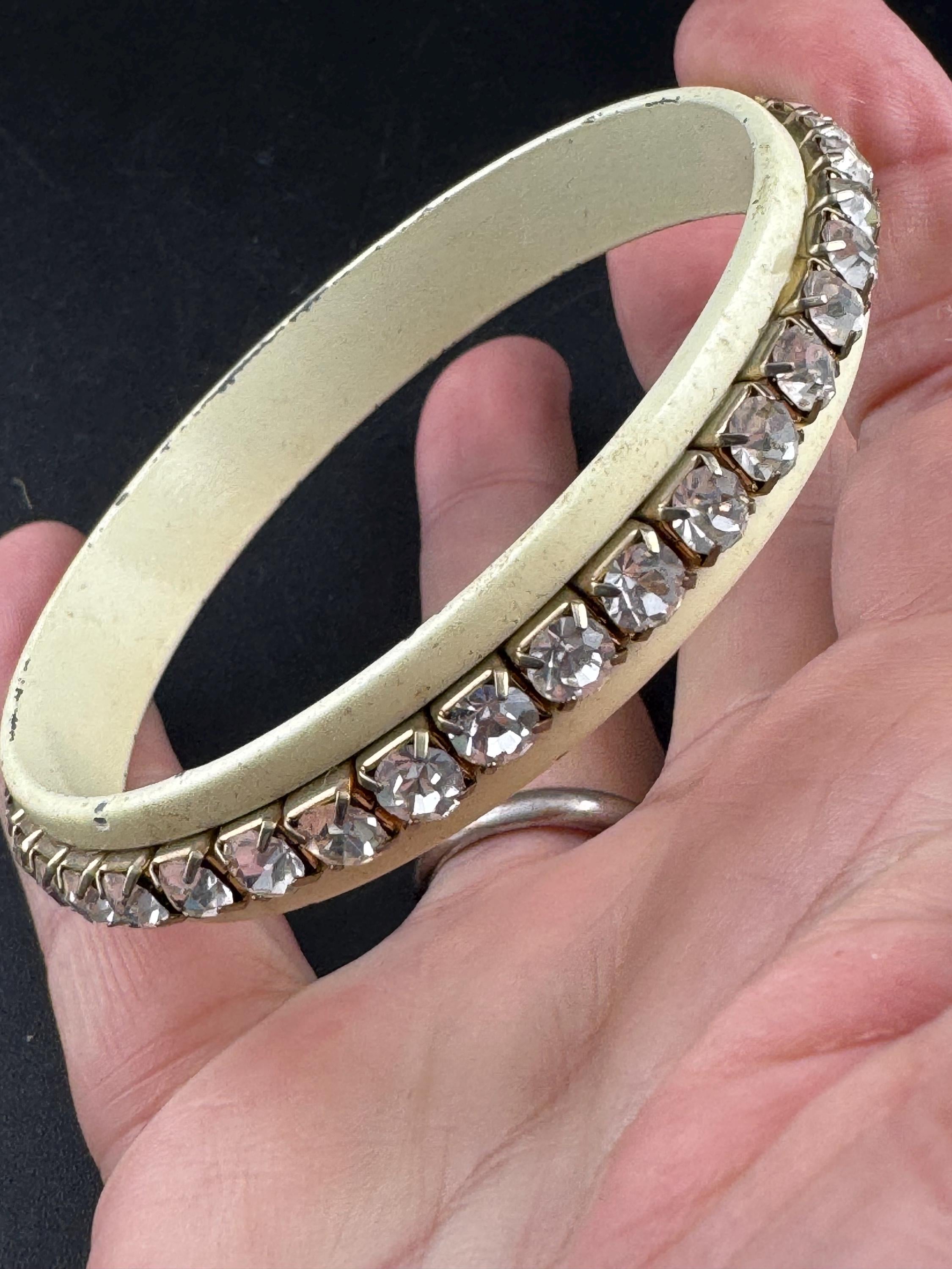 1960s cream enamel and clear diamanté fixed, slim bangle bracelet with wear