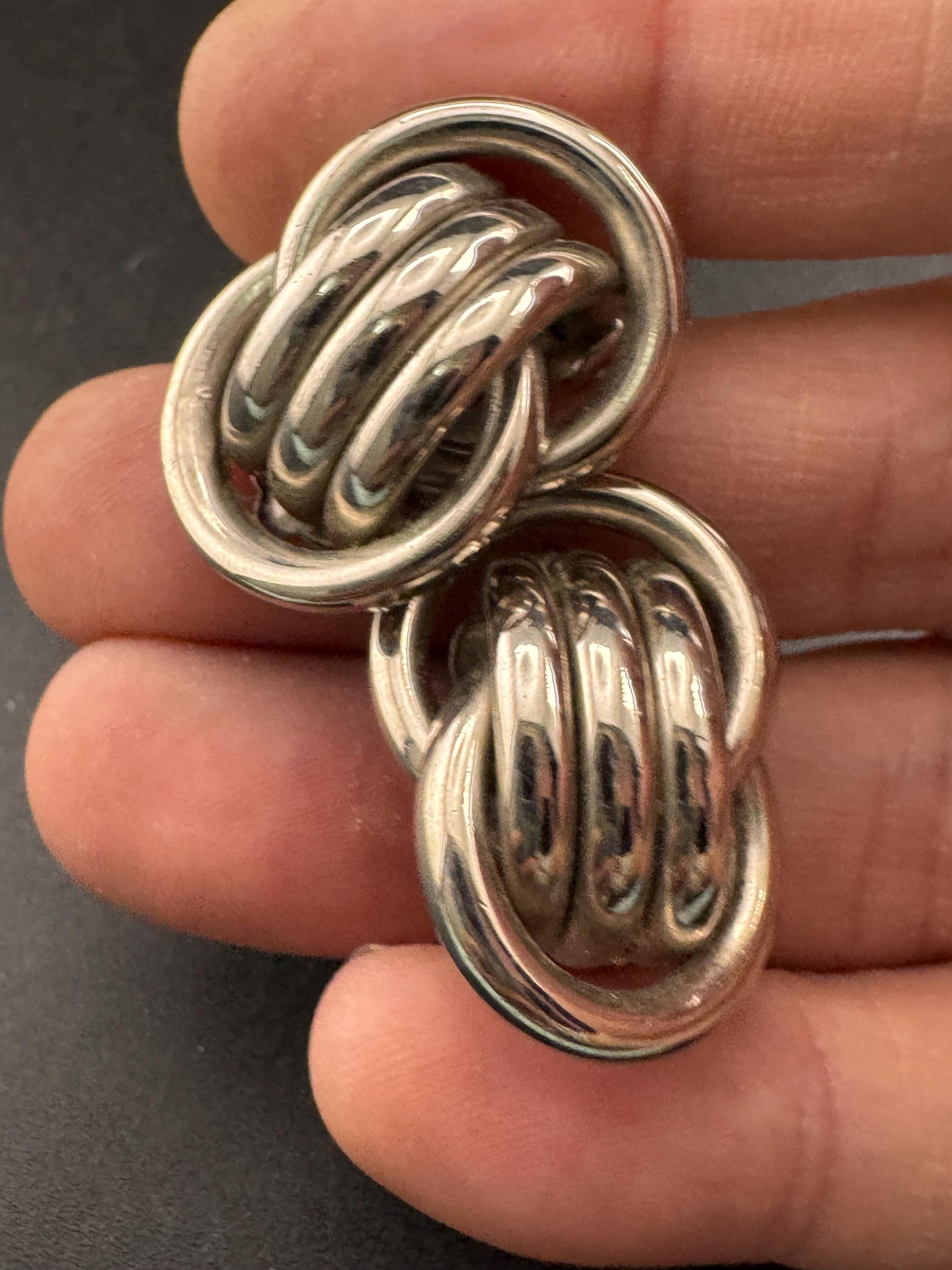1980s vintage metal tube knot clip on earrings, silver tone