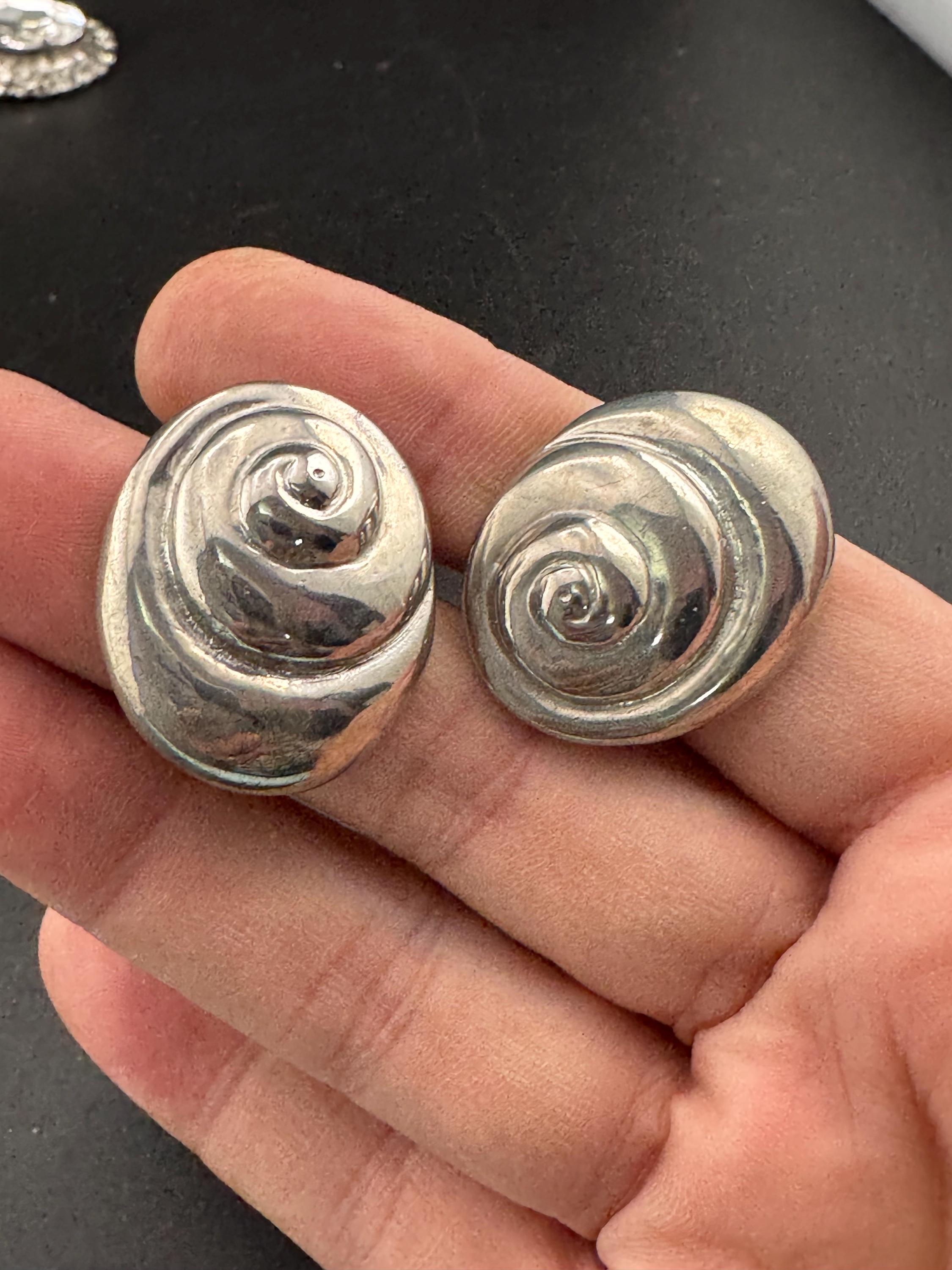 Vintage swirl seashell clip on earrings, silver tone metal studs