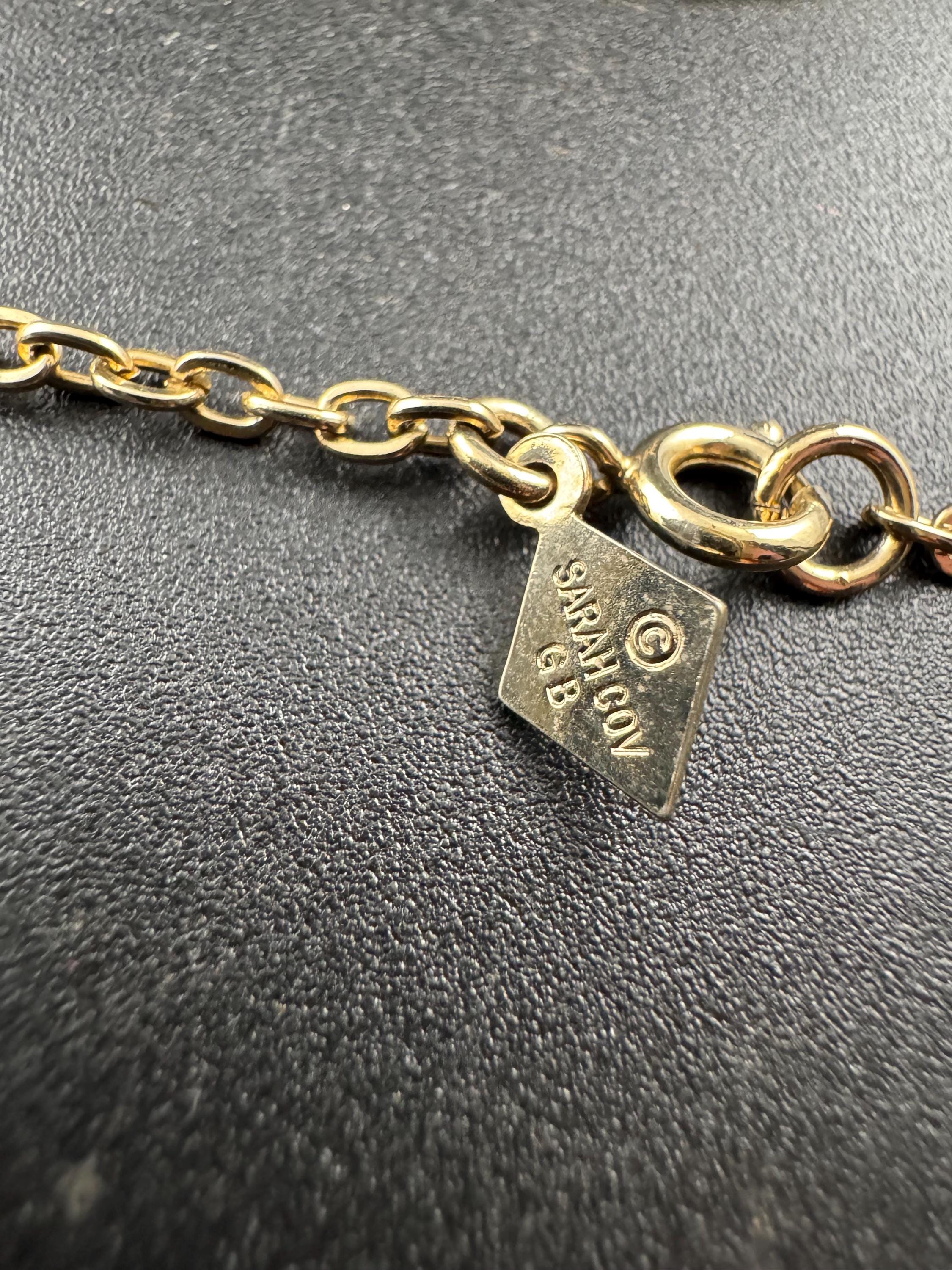 Signed Sarah Coventry orbit pendant chain necklace , gold tone 1970s vintage