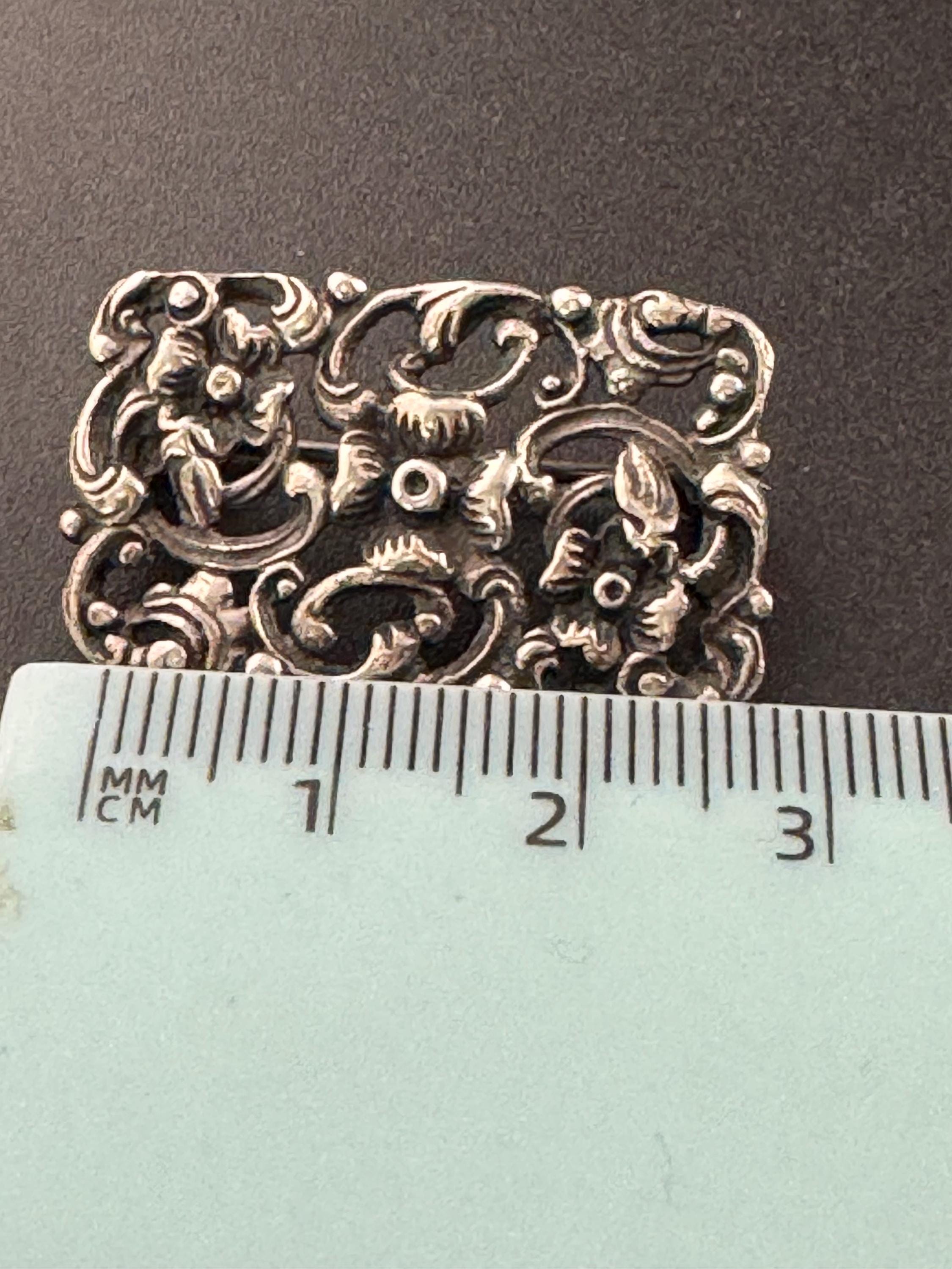 Antique 835 grade continental silver art nouveau floral brooch