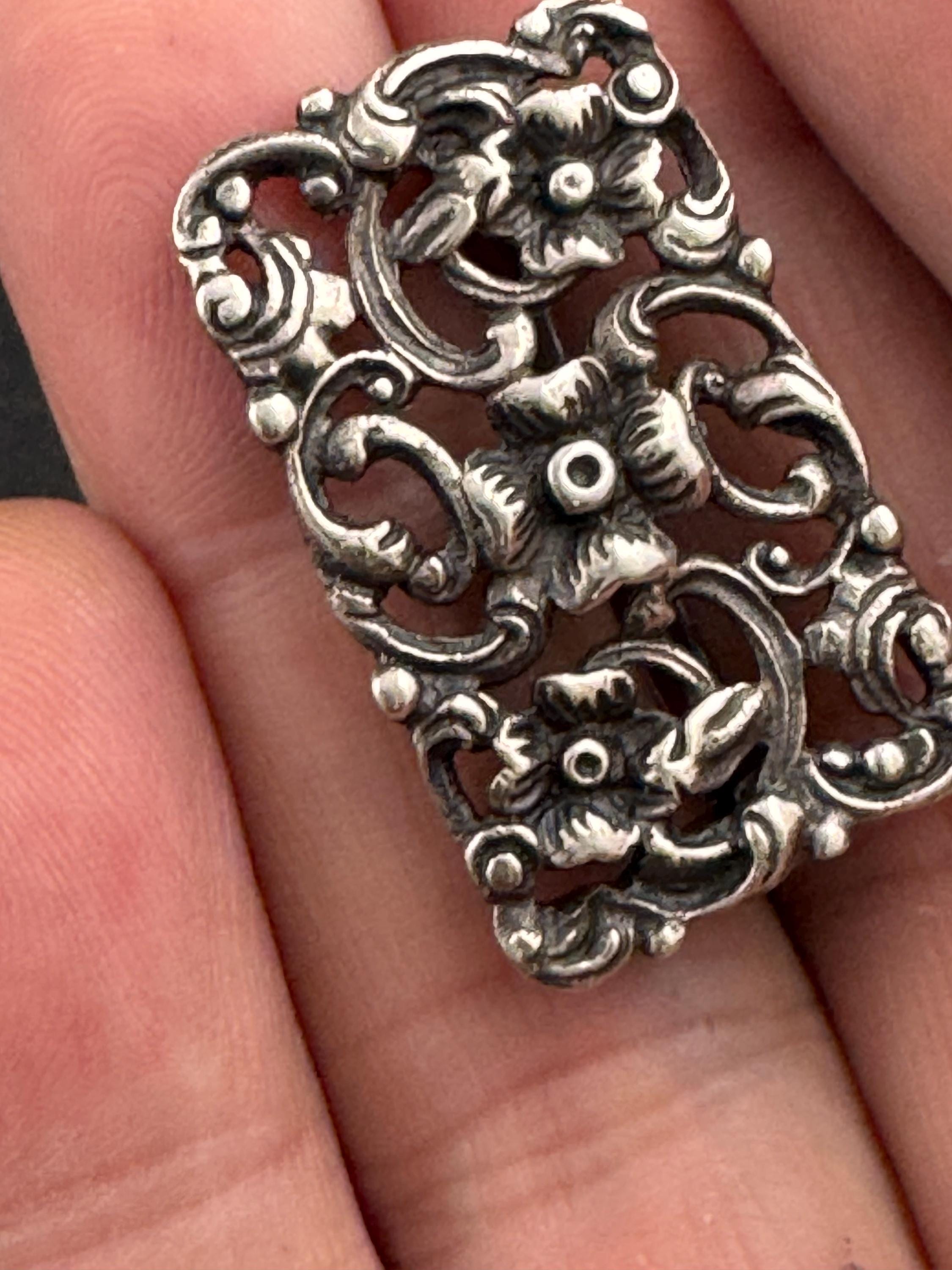 Antique 835 grade continental silver art nouveau floral brooch