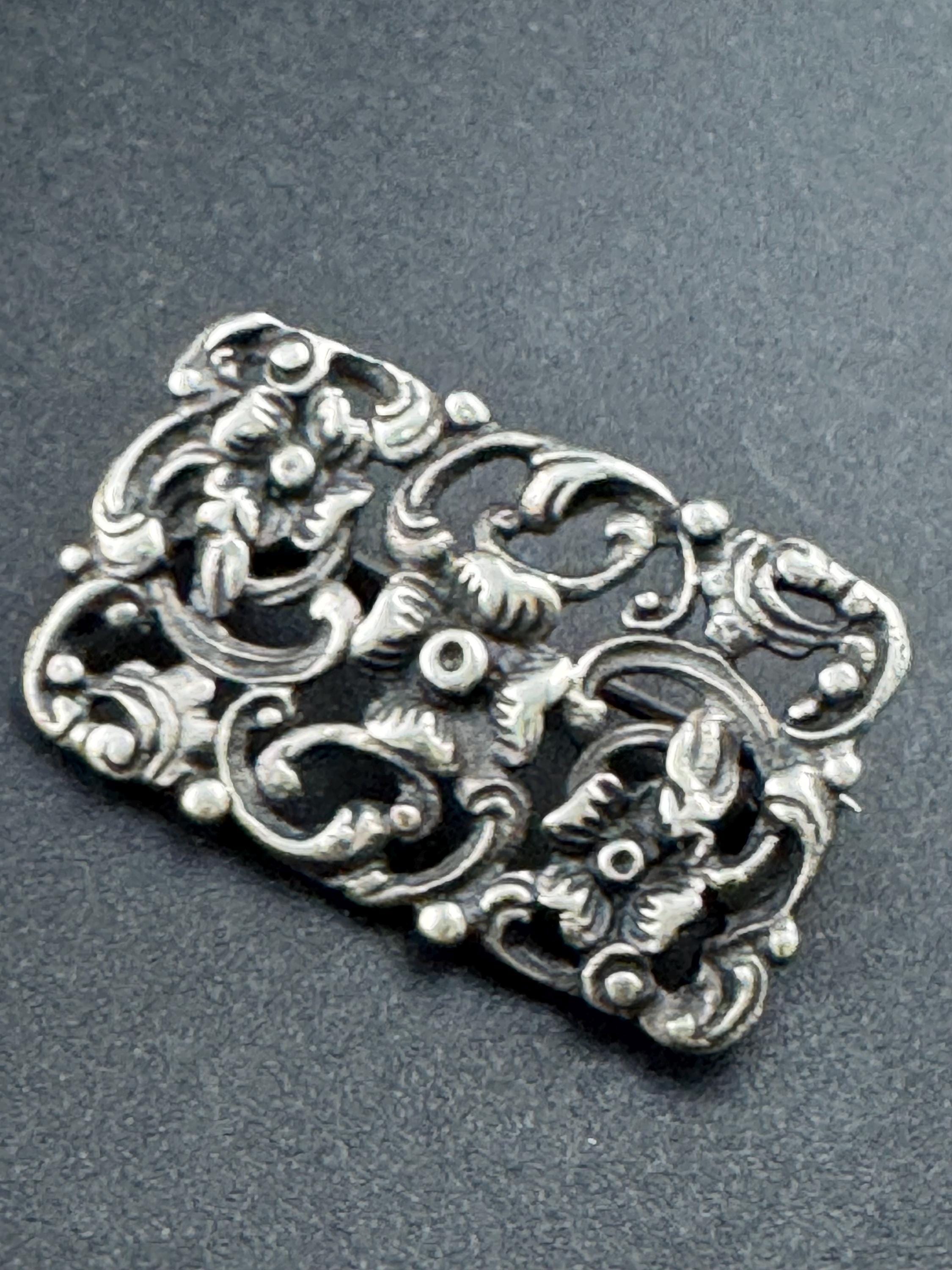 Antique 835 grade continental silver art nouveau floral brooch