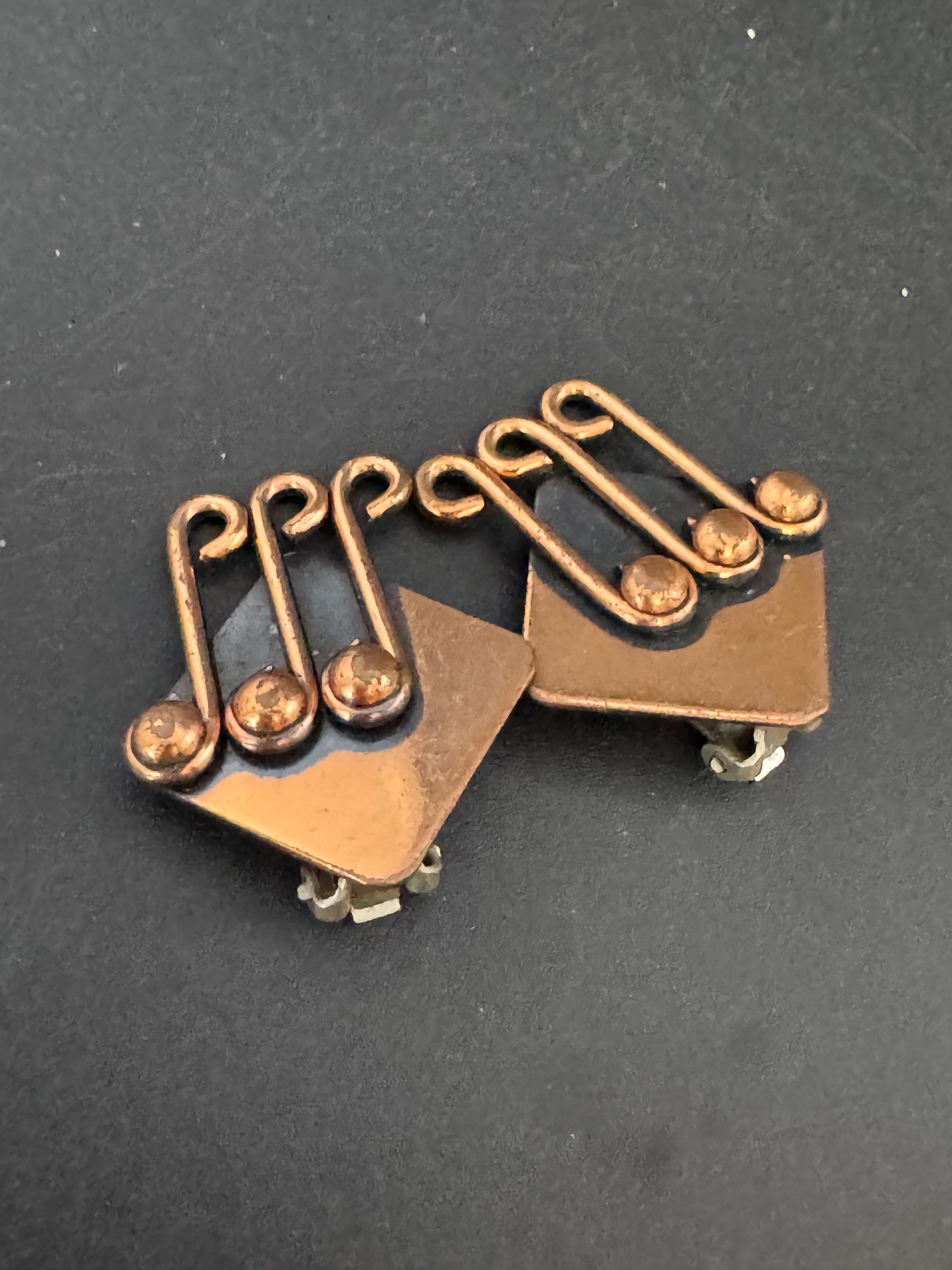 Modernist signed Renoir copper musical clip on earrings 1960s 1970s