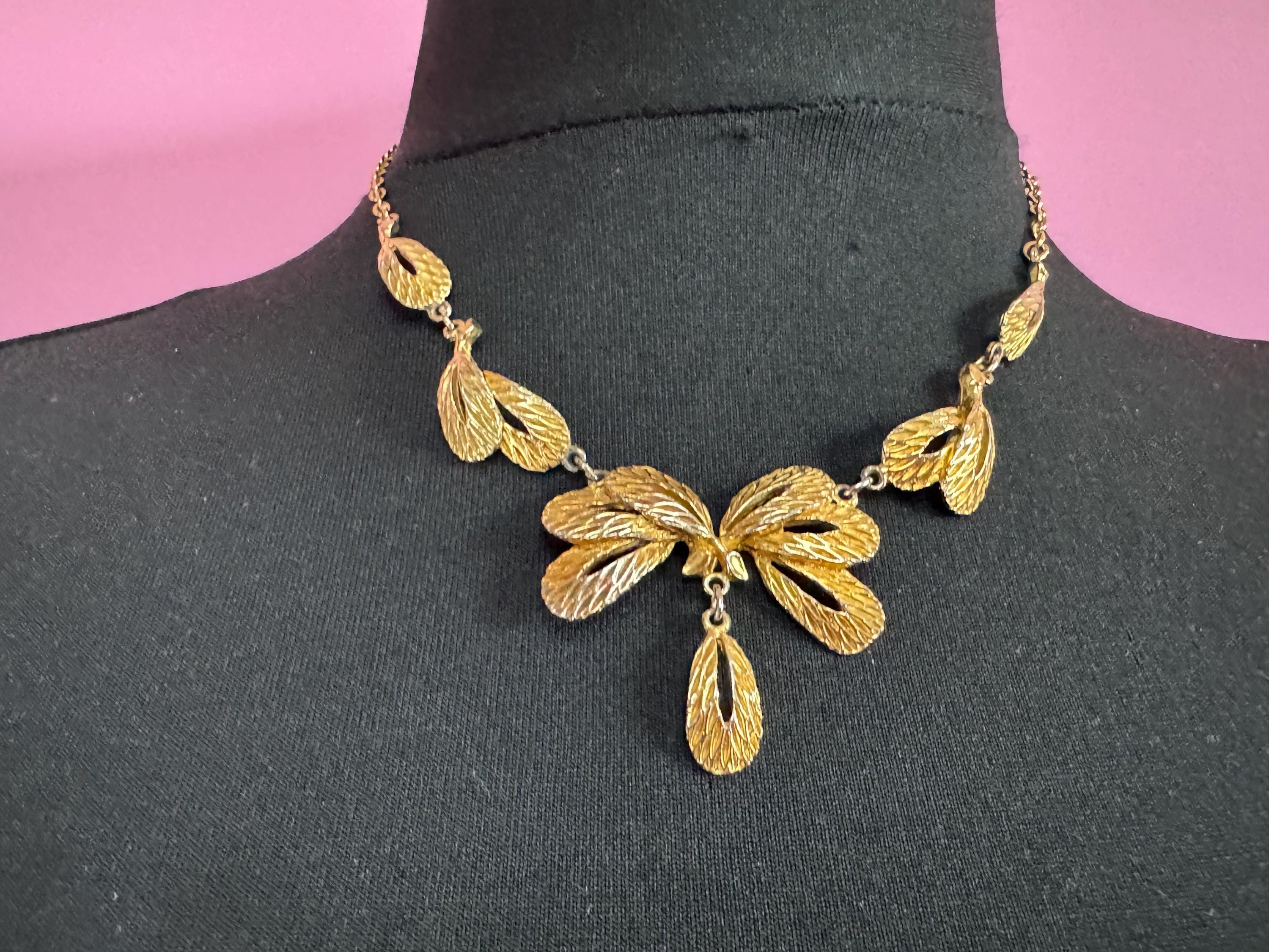 Signed Hollywood gold tone pendant necklace, mid century