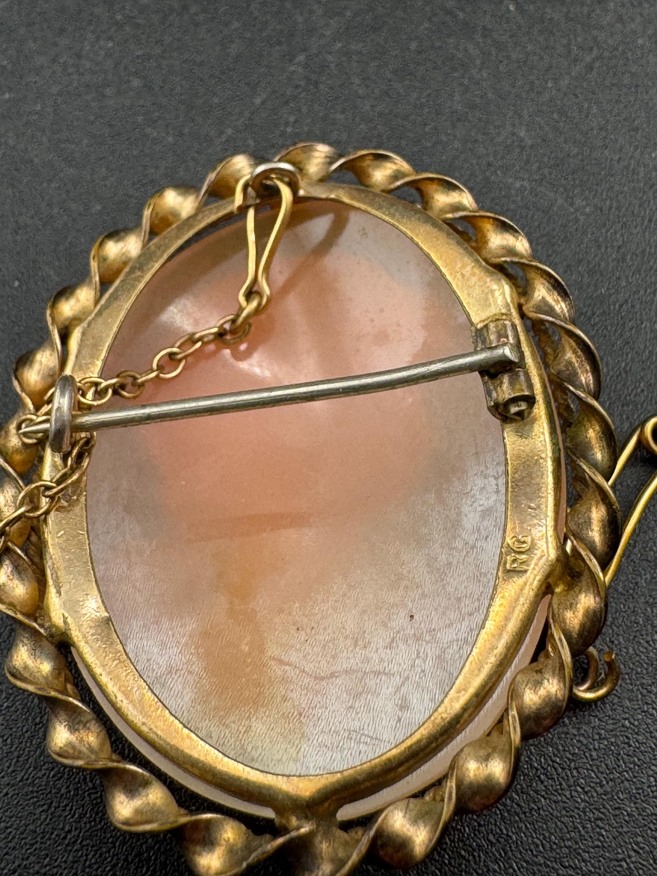 Rolled gold carved shell cameo brooch , 4cm safety clasp