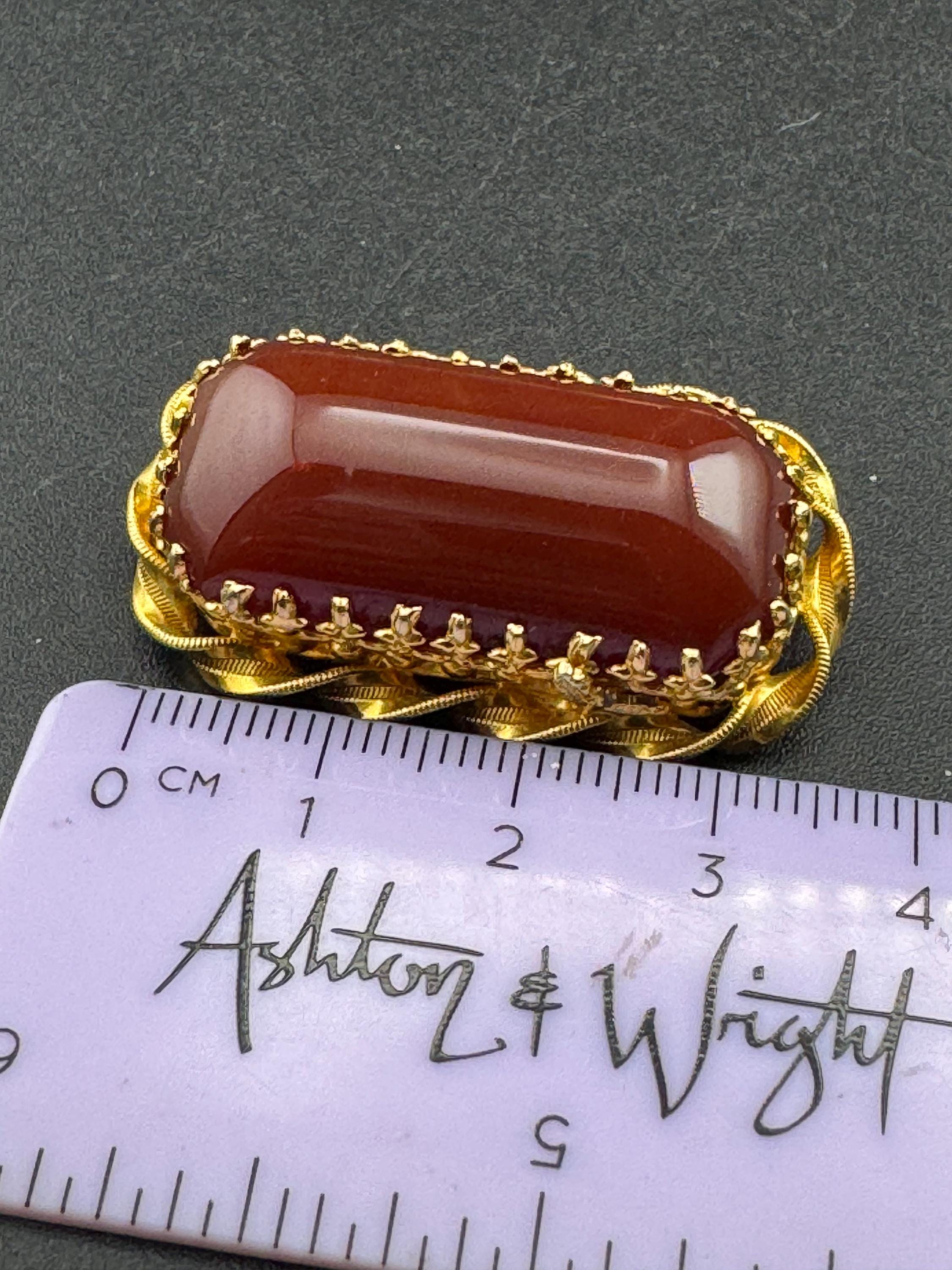 Signed Austria Red carnelian cabochon brooch, gold plated