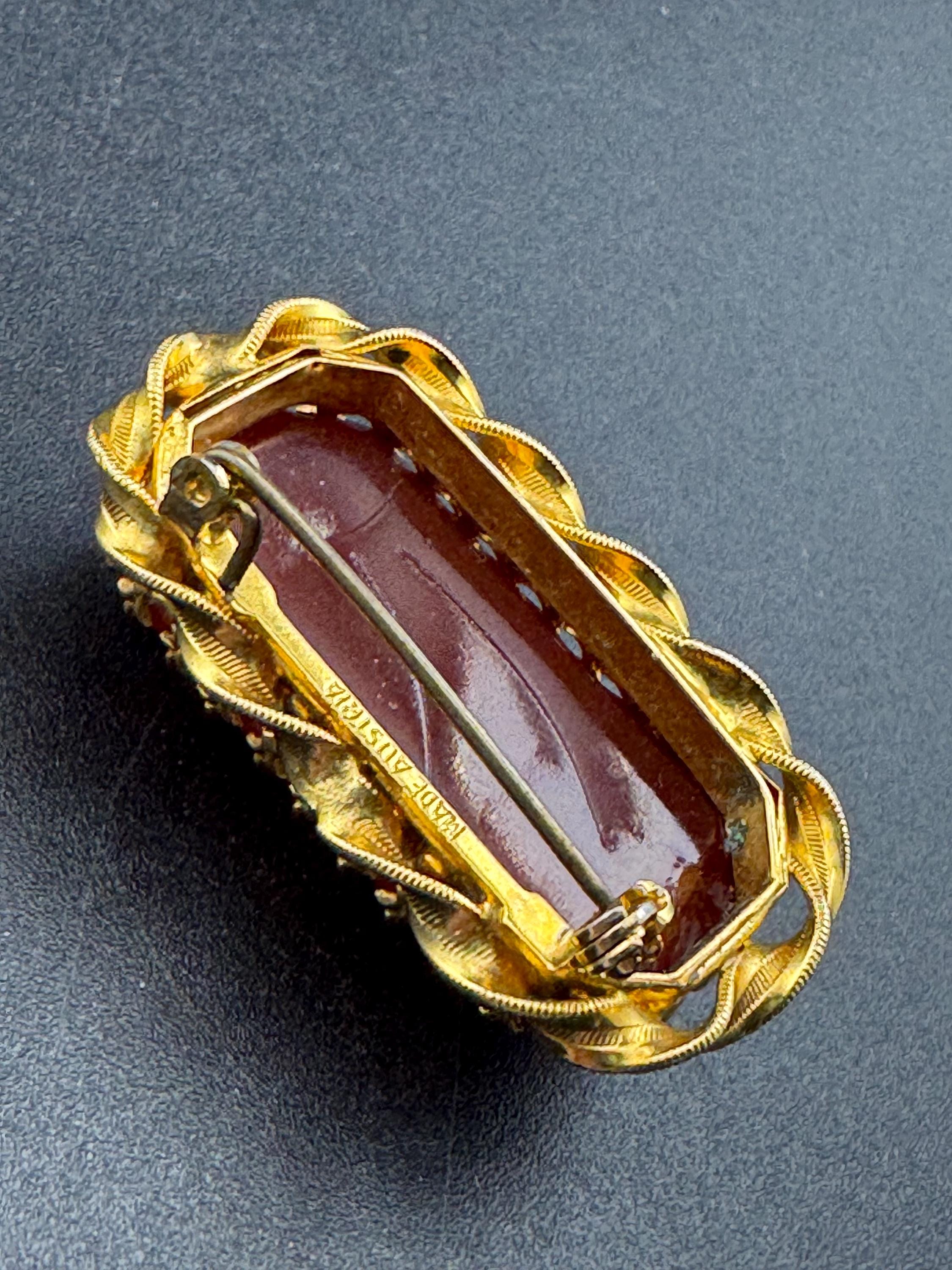 Signed Austria Red carnelian cabochon brooch, gold plated