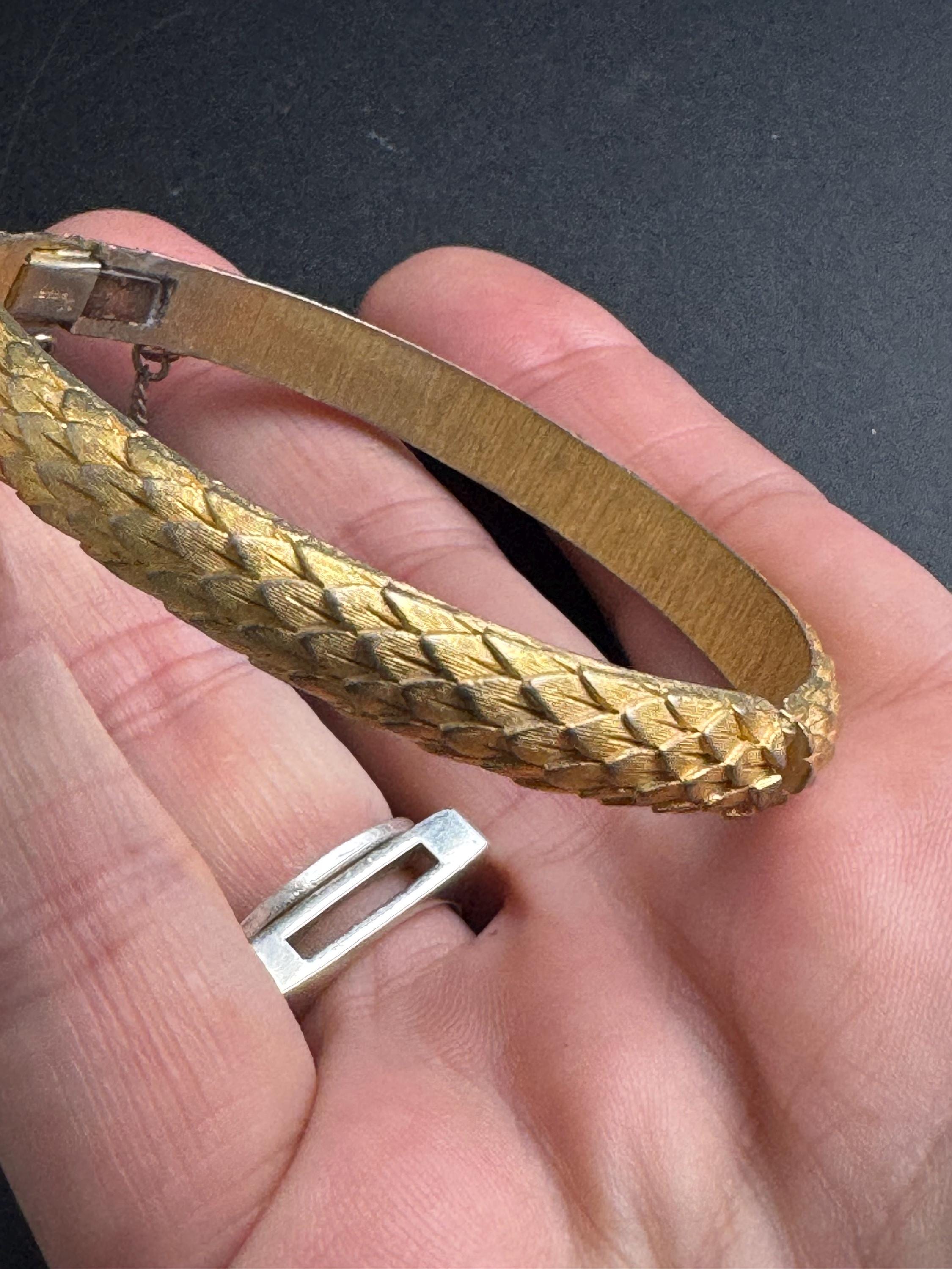 Crown Trifari gold-tone hinged bangle bracelet, textured snake or fish scale pattern