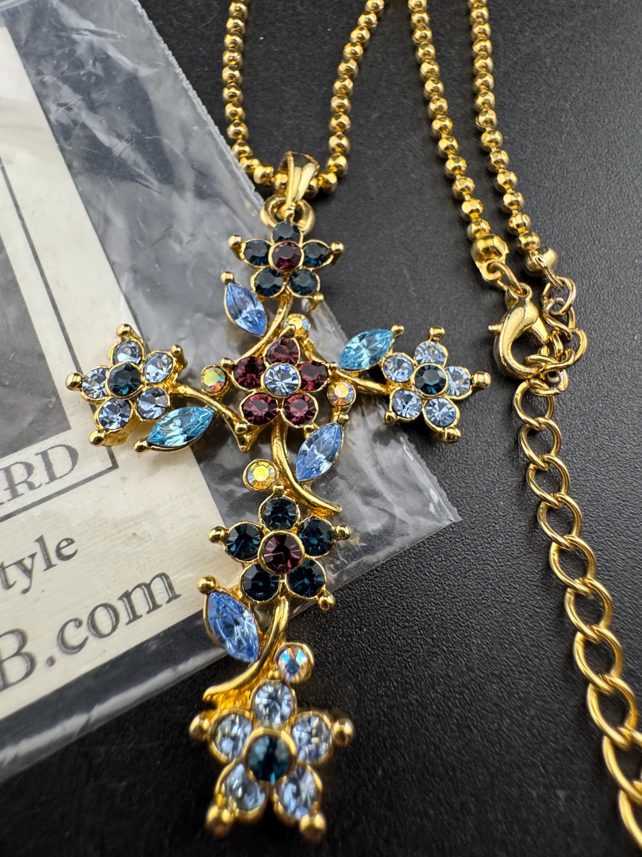 Suzanne Bjontegatd coloured rhinestone cross pendant on gold tone ball chain