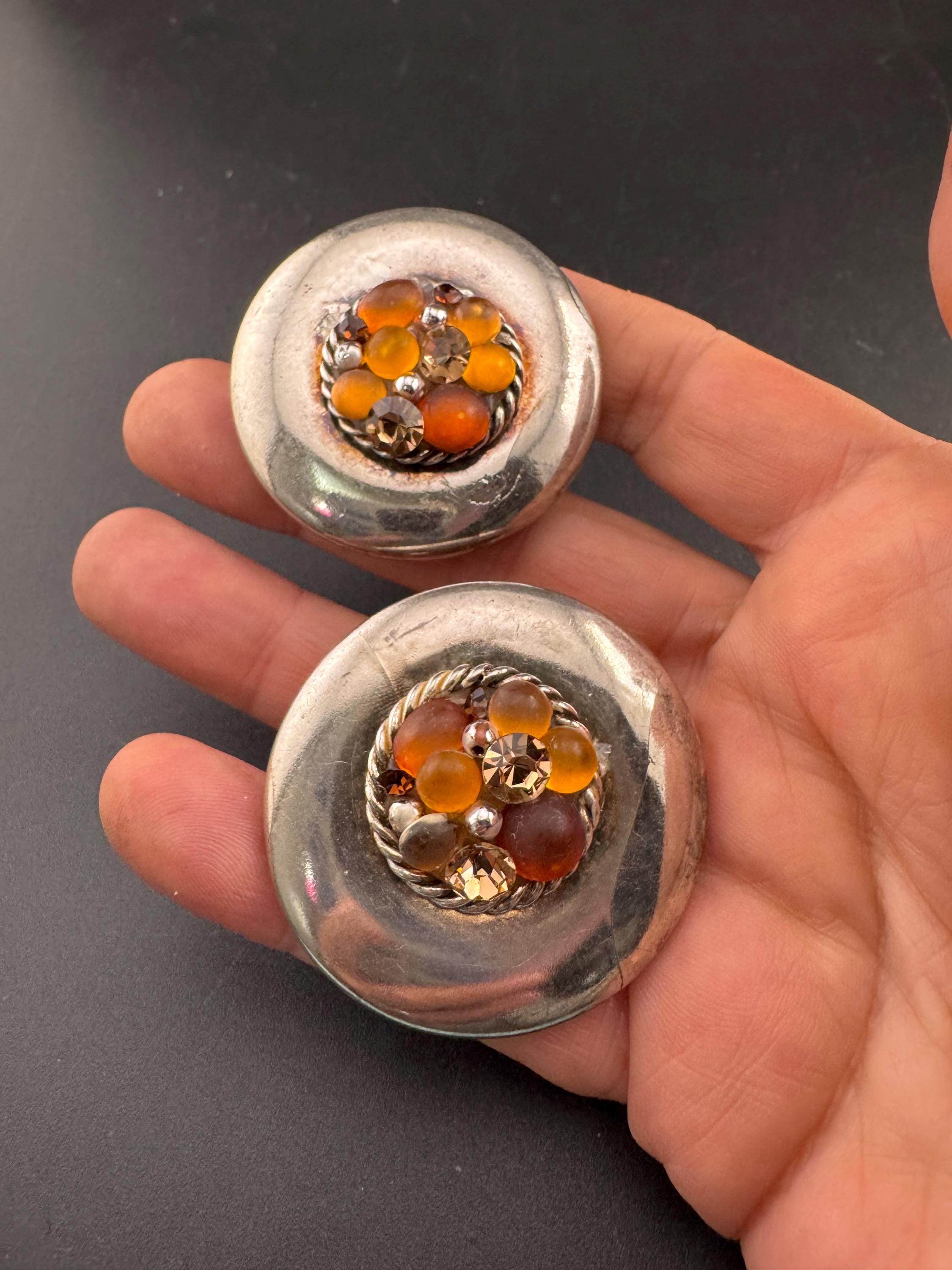 Jacky de G Oversized silver domed Clip On Earrings: designer orange stones