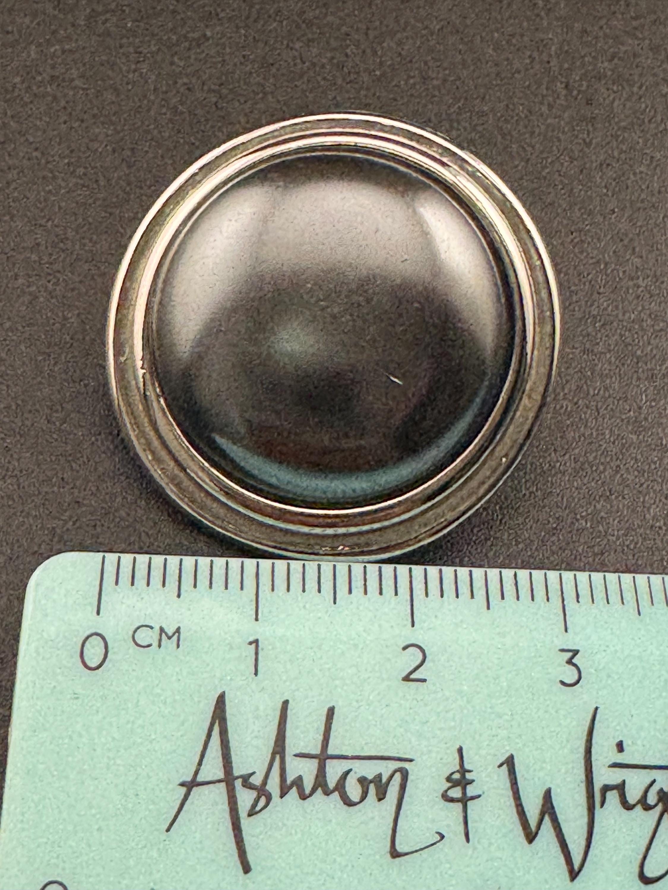 Signed YSL grey domed Clip On Earrings: 4cm silver by yves Saint Laurent