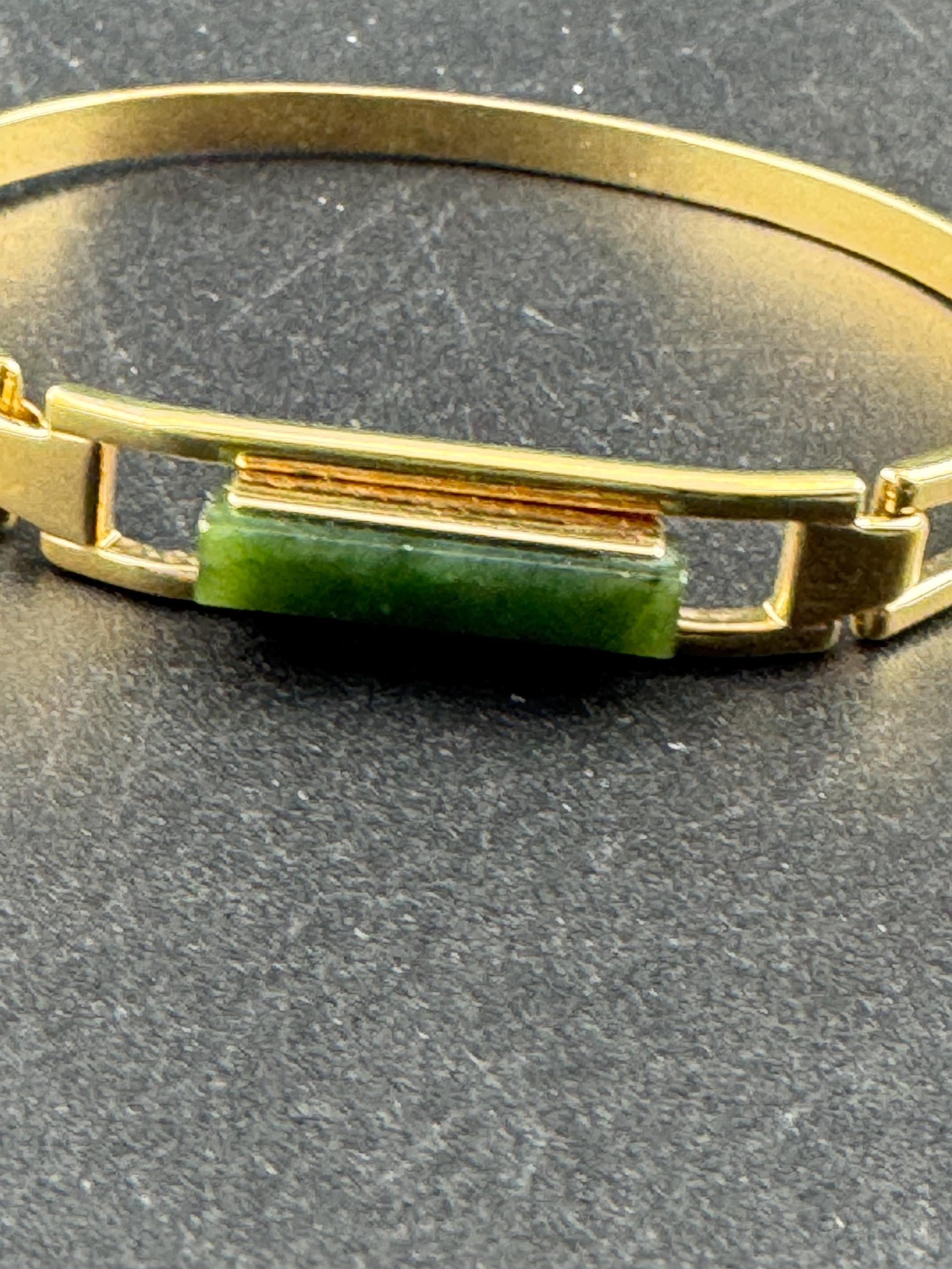 Vintage signed Avon gold tone green jade glass hinged bangle