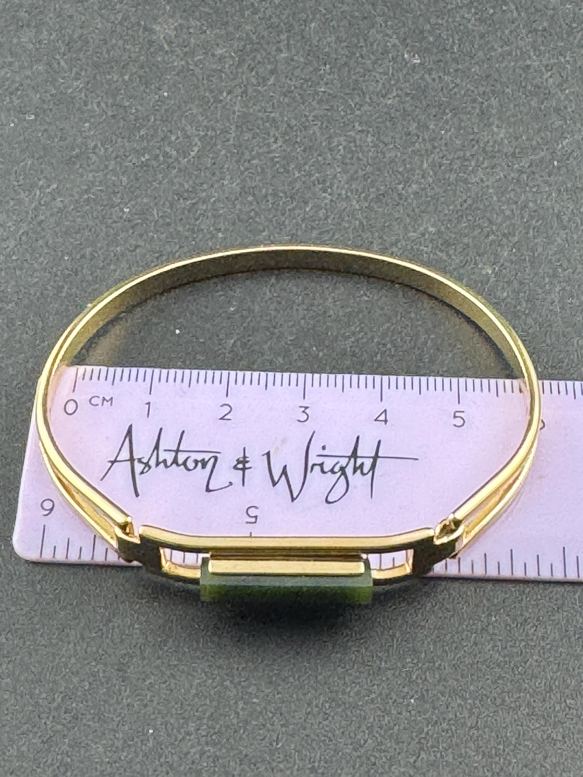 Vintage signed Avon gold tone green jade glass hinged bangle